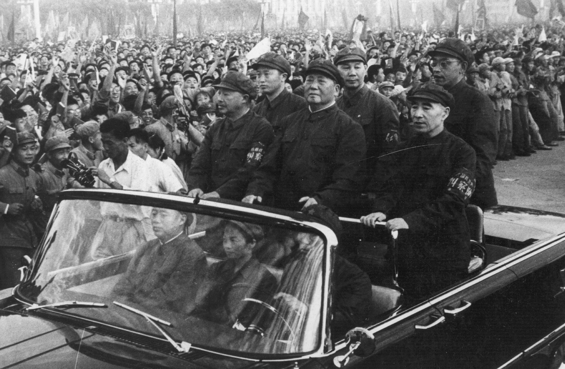 Chinese leader Mao Zedong accompanied by second-in-command Lin Biao passes through a 1966 Tiananmen Square rally.
