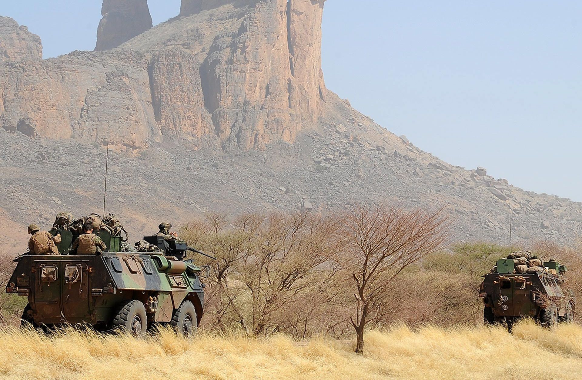 A convoy of French army vehicles heads toward Gao on February 7, 2013, on the road from Gossi after four Malian civilians were killed by a landmine in territory reclaimed from Islamist rebels. 