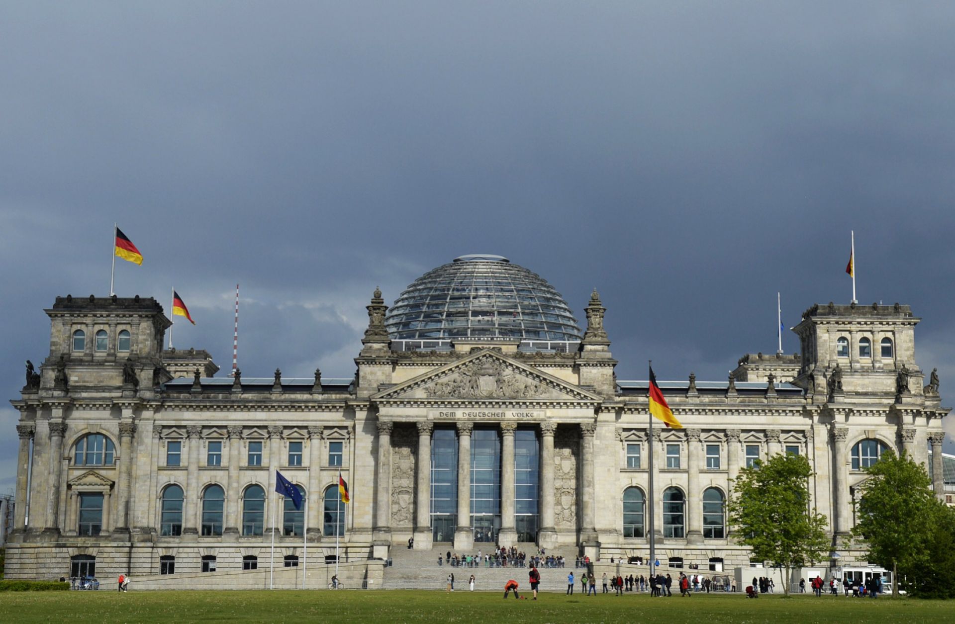 Dark clouds over the Reichstag building in Berlin may be a sign of things to come.