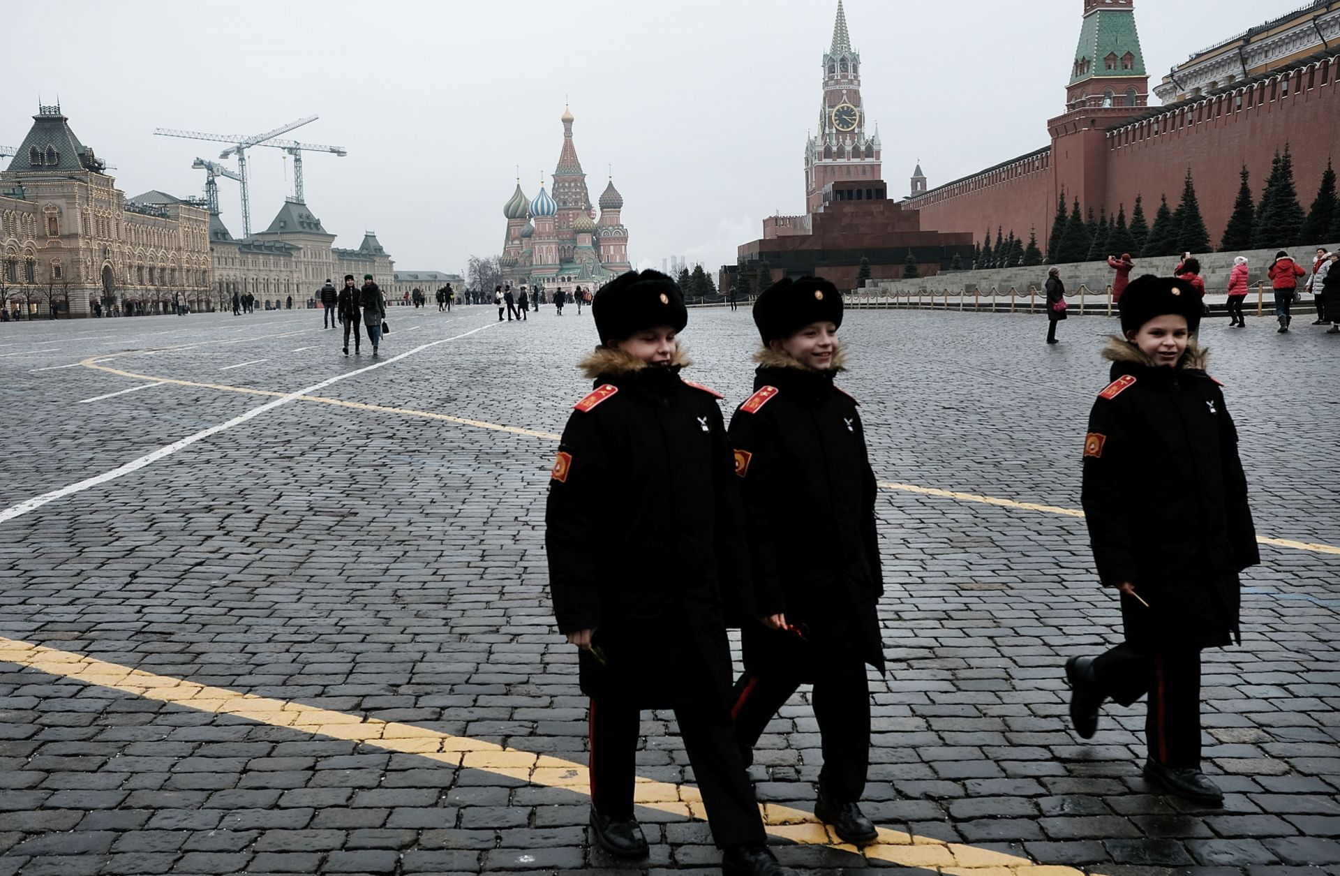 Young boys walk through Moscow's Red Square in military uniforms March 7. In Eurasia, the remnants of the Soviet era are starting to fade as more and more people are born into a post-Soviet world.