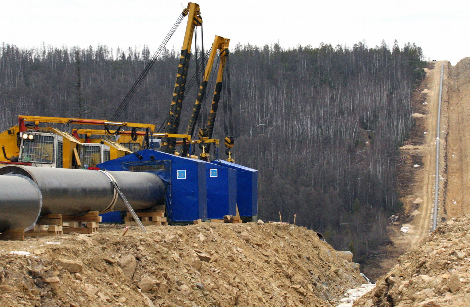 View of pipes and equipment near a trench of the Eastern Siberia-Pacific Ocean oil pipeline in Siberia, Russia.