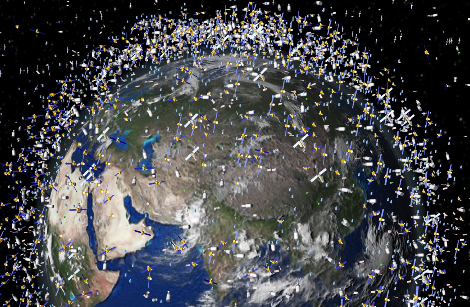 An illustration shows the many objects being tracked in low Earth orbit. Space is becoming more congested, contested and competitive, and there is a growing possibility that battles could start to be waged in space.
