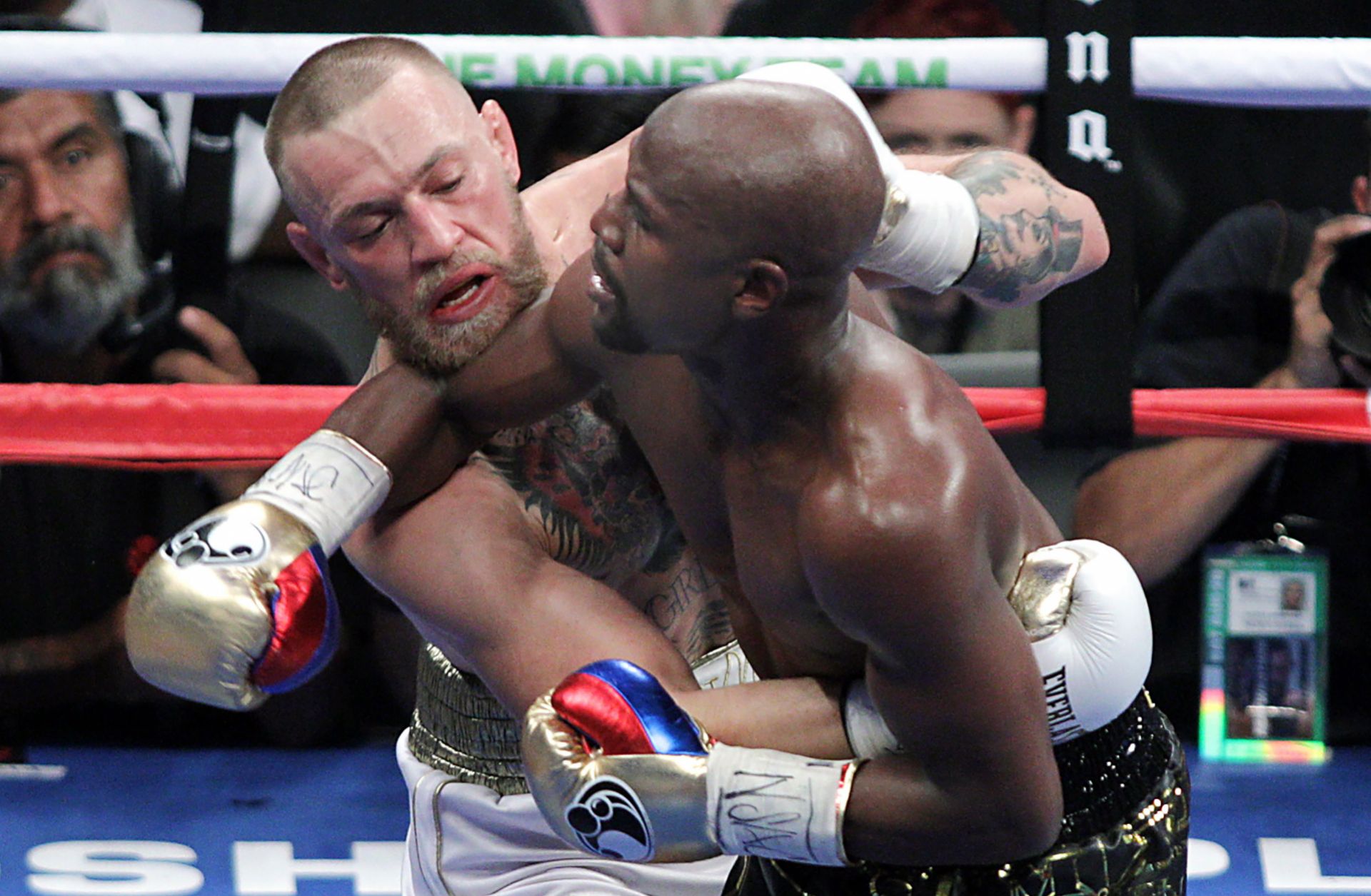 Mixed martial arts star Conor McGregor (L) competes with boxer Floyd Mayweather Jr. in Las Vegas on Aug. 26.