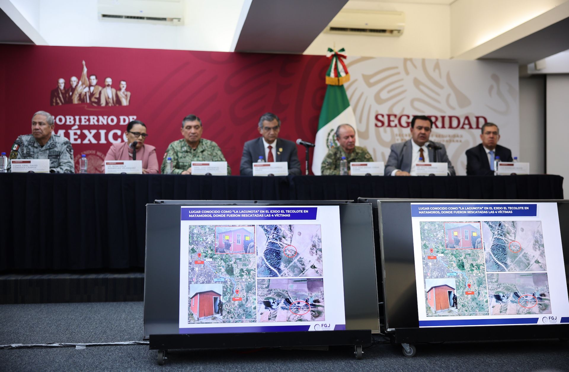 Images of the place where four U.S. citizens were found after being kidnapped in Matamoros, Mexico, are shown on screens during a press conference in Mexico City on March 7, 2023. Images of the place where four U.S. citizens were found after being kidnapped in Matamoros, Mexico, are shown on screens during a press conference in Mexico City on March 7, 2023.