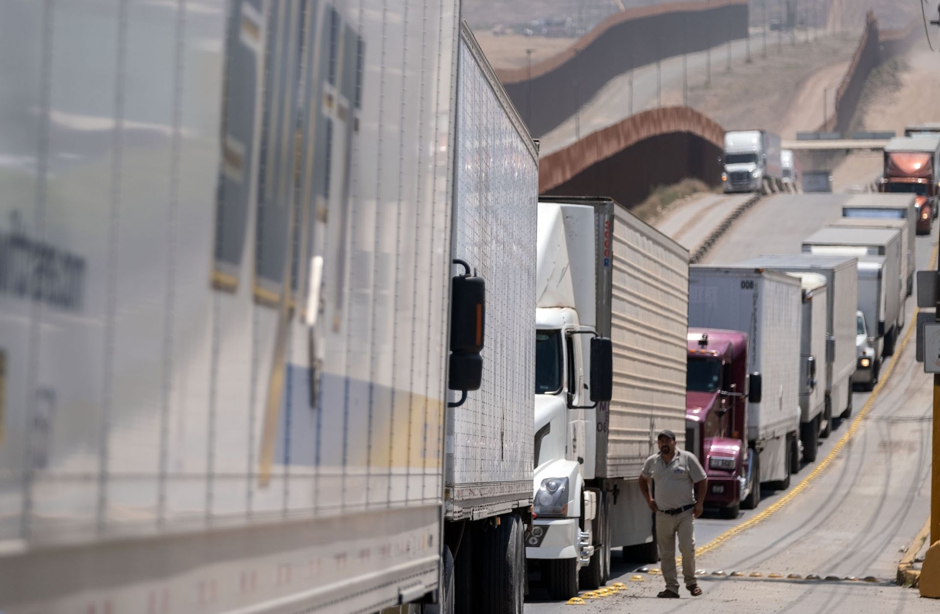 In response to the White House threat to impose tariffs on its imports, Mexico has agreed to ramp up enforcement on its southern border with Guatemala in an effort to stop migrants crossing illegally from Central America and continuing on to the United States. Cargo trucks line up a the Otay commercial crossing in Tijuana, Baja California, in Mexico.