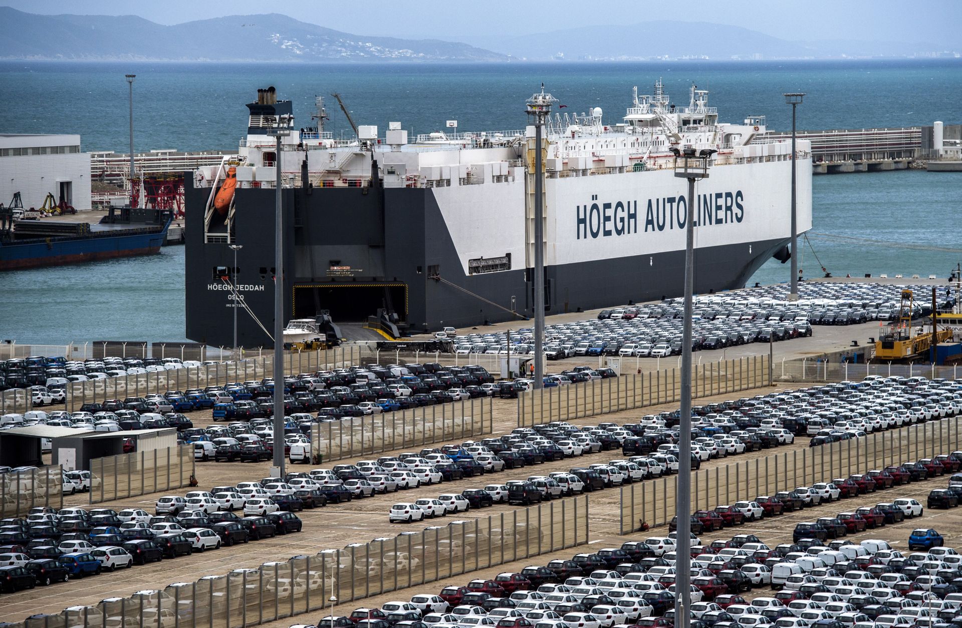 A picture taken on March 12, 2018, shows a ship docked at the Tanger Med container port and Renault terminal in Ksar Sghir, near the northeastern Moroccan port city of Tangiers overlooking the Strait of Gibraltar.