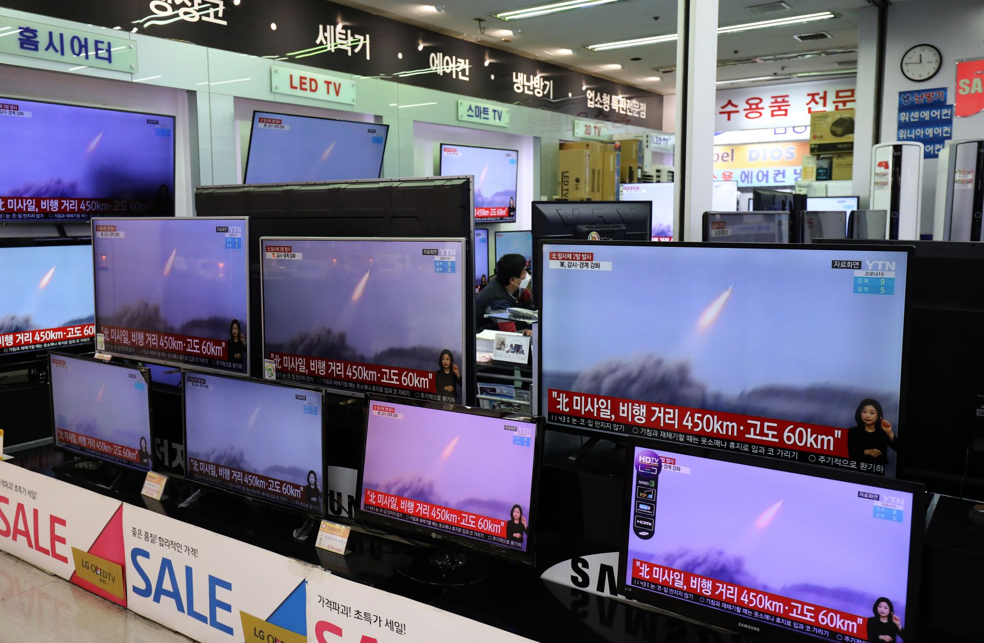 TV screens show the launch of North Korean missiles on March 25, 2021, in Seoul, South Korea. 