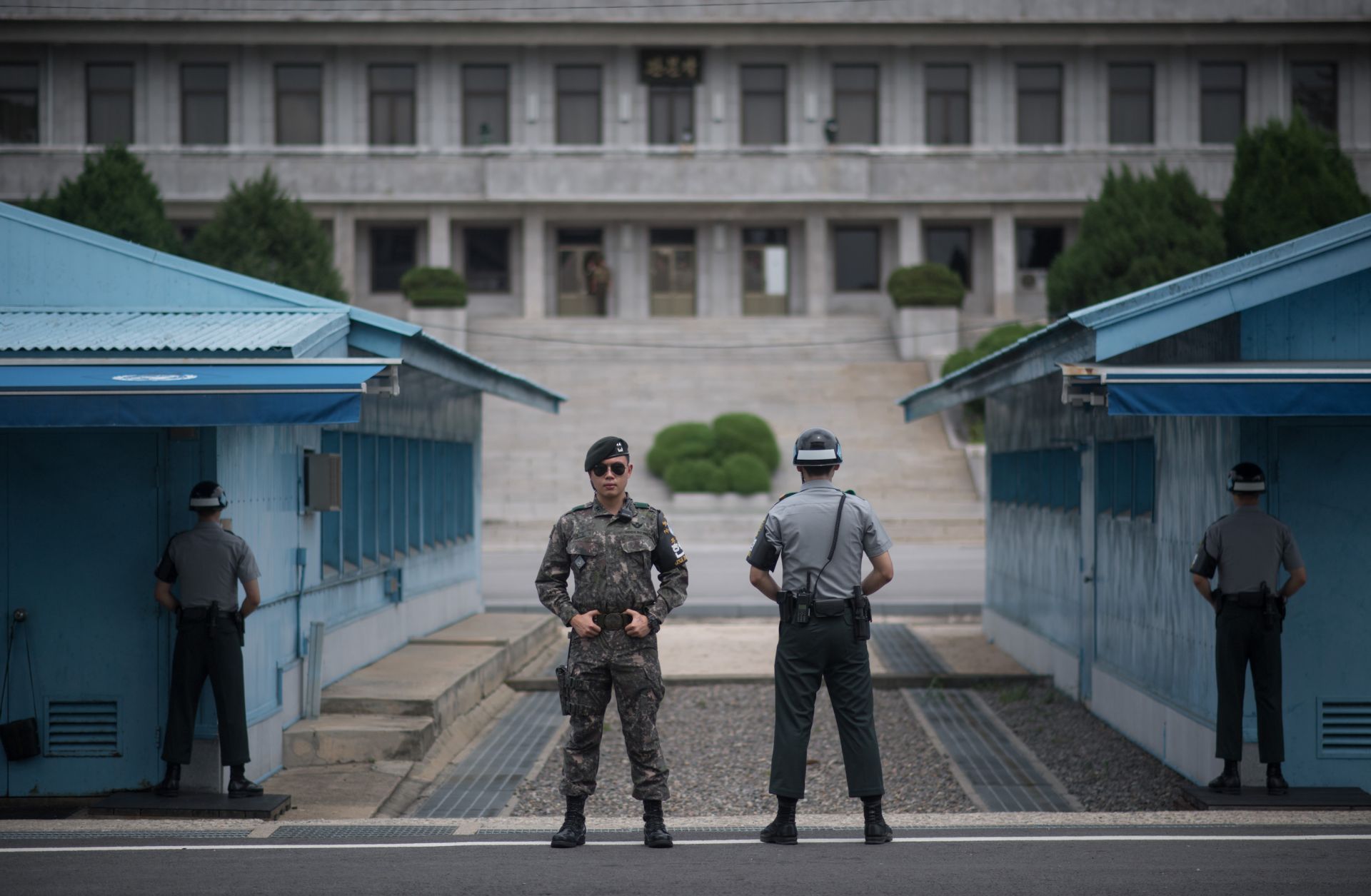 South Korean soldiers stand on duty at the Demilitarized Zone along the 38th parallel, the line distinguishing North Korea from South Korea.