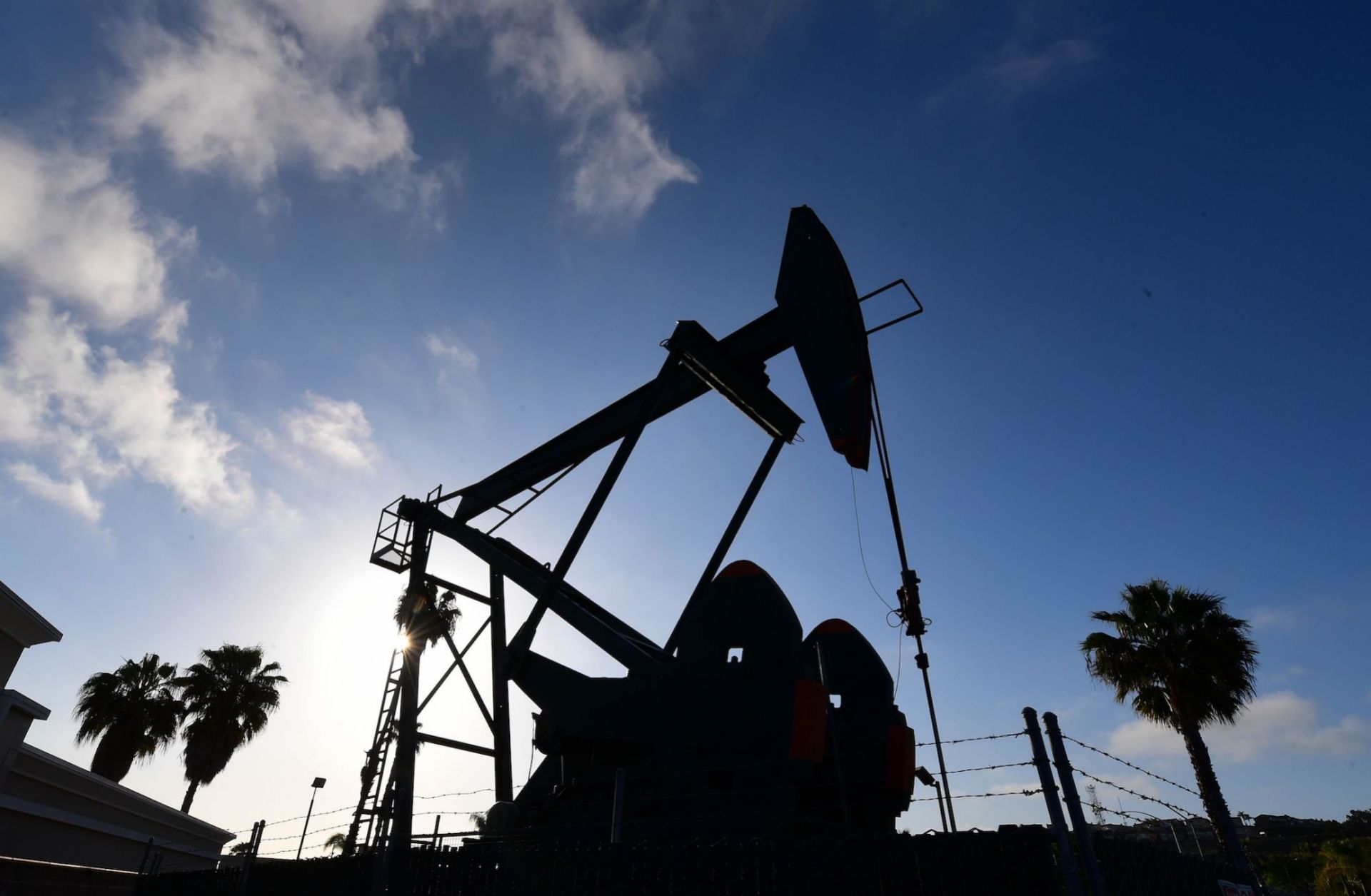 An oil pumpjack operates in Signal Hill, California, on April 21, 2020, a day after oil prices dropped to below zero amid the ongoing COVID-19 pandemic. An oil pumpjack operates in Signal Hill, California, on April 21, 2020, a day after oil prices dropped to below zero amid the ongoing COVID-19 pandemic.