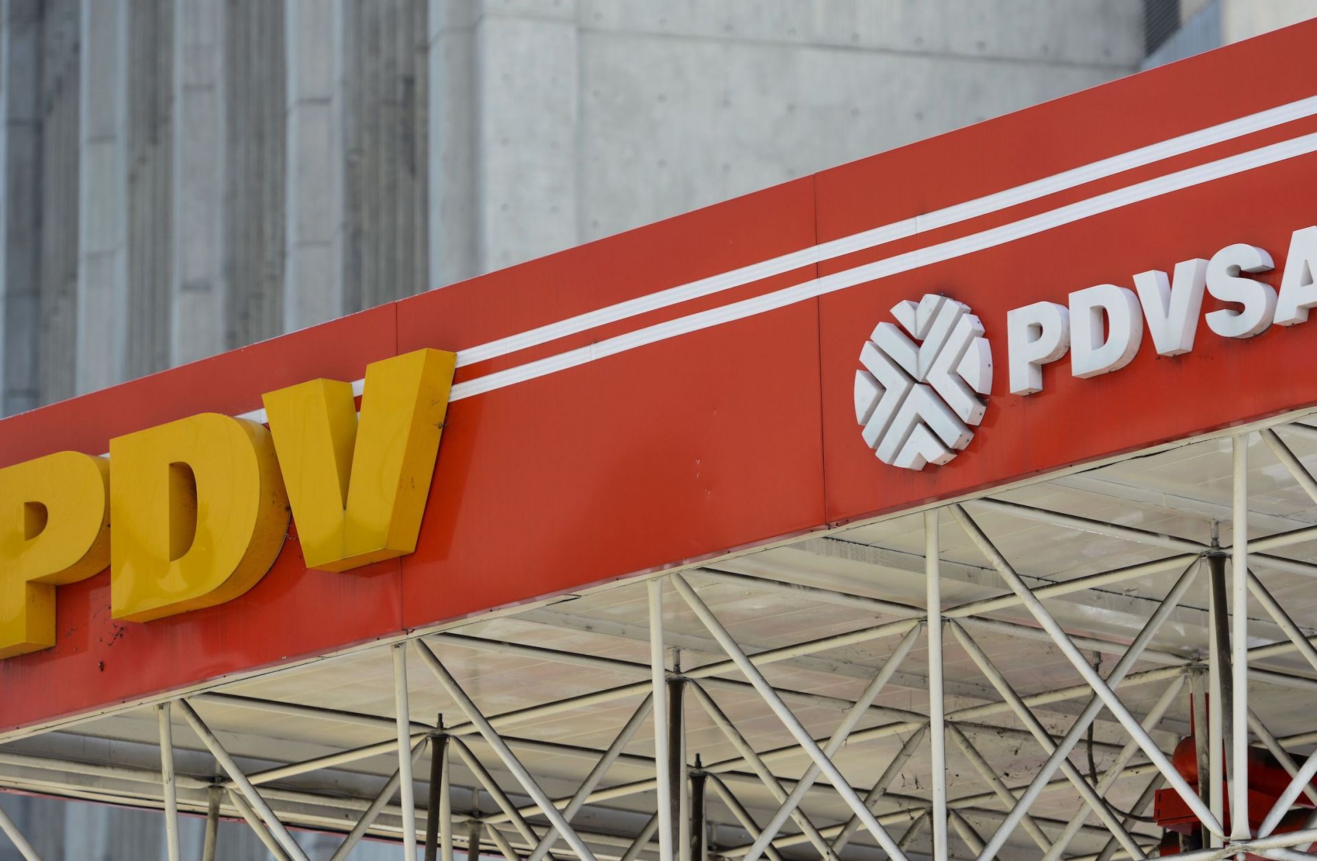 A photograph shows the logo of Venezuelan state-owned oil company PDVSA at a gas station in Caracas during November 2017.