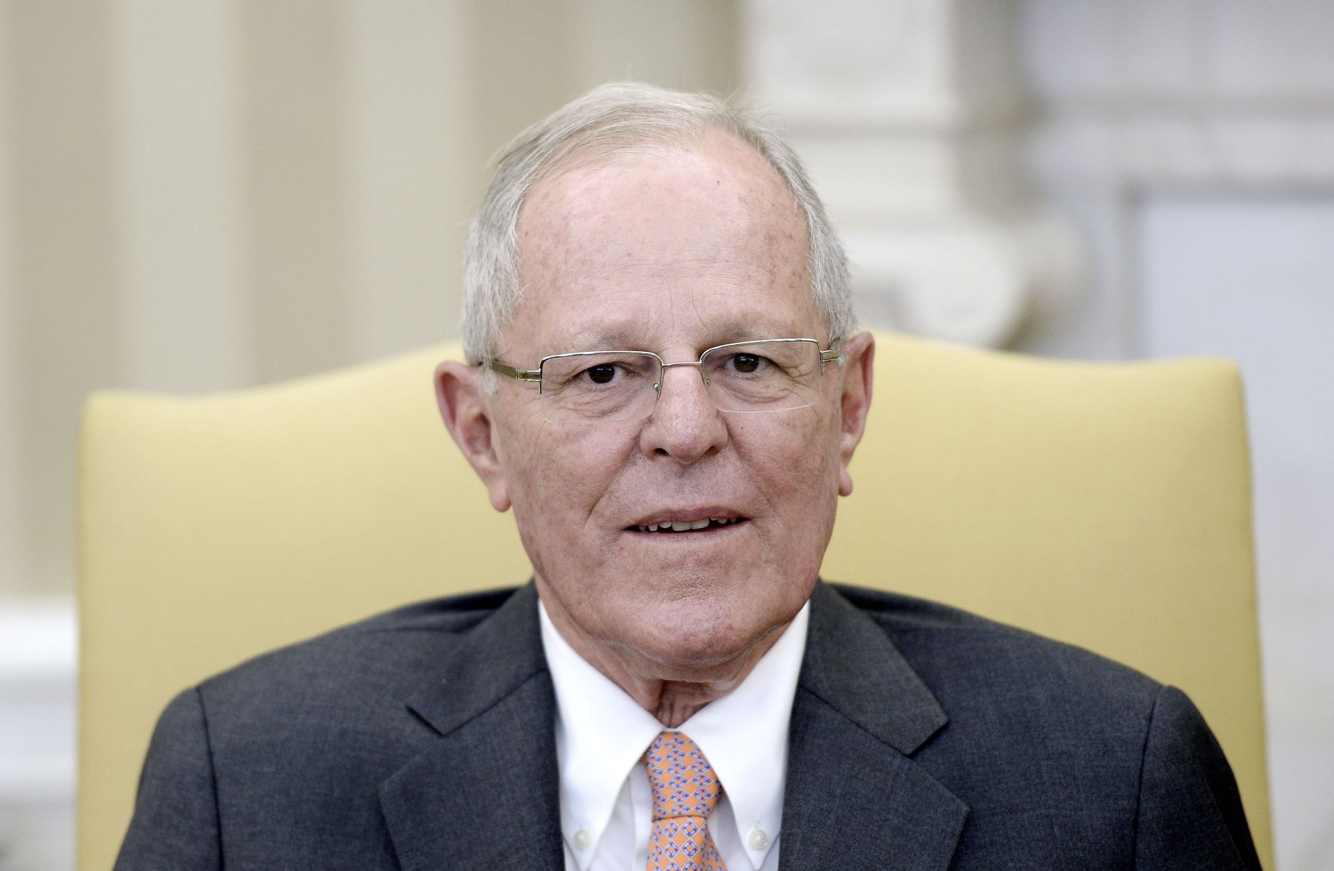 Peruvian President Pedro Pablo Kuczynski sits in the Oval Office of the White House during a meeting with U.S. President Donald Trump in February 2017.