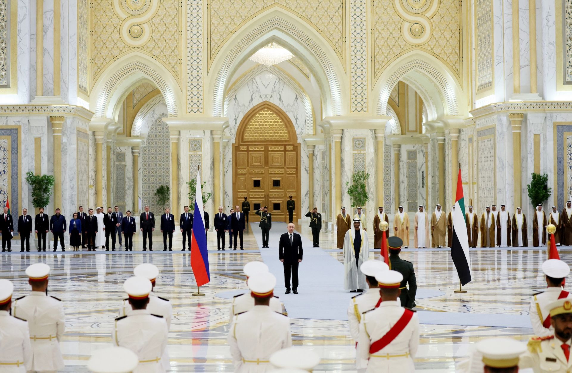 Russian President Vladimir Putin and UAE leader Sheikh Mohammed bin Zayed Al Nahyan attend a welcoming ceremony ahead of their talks in Abu Dhabi on Dec. 6, 2023.