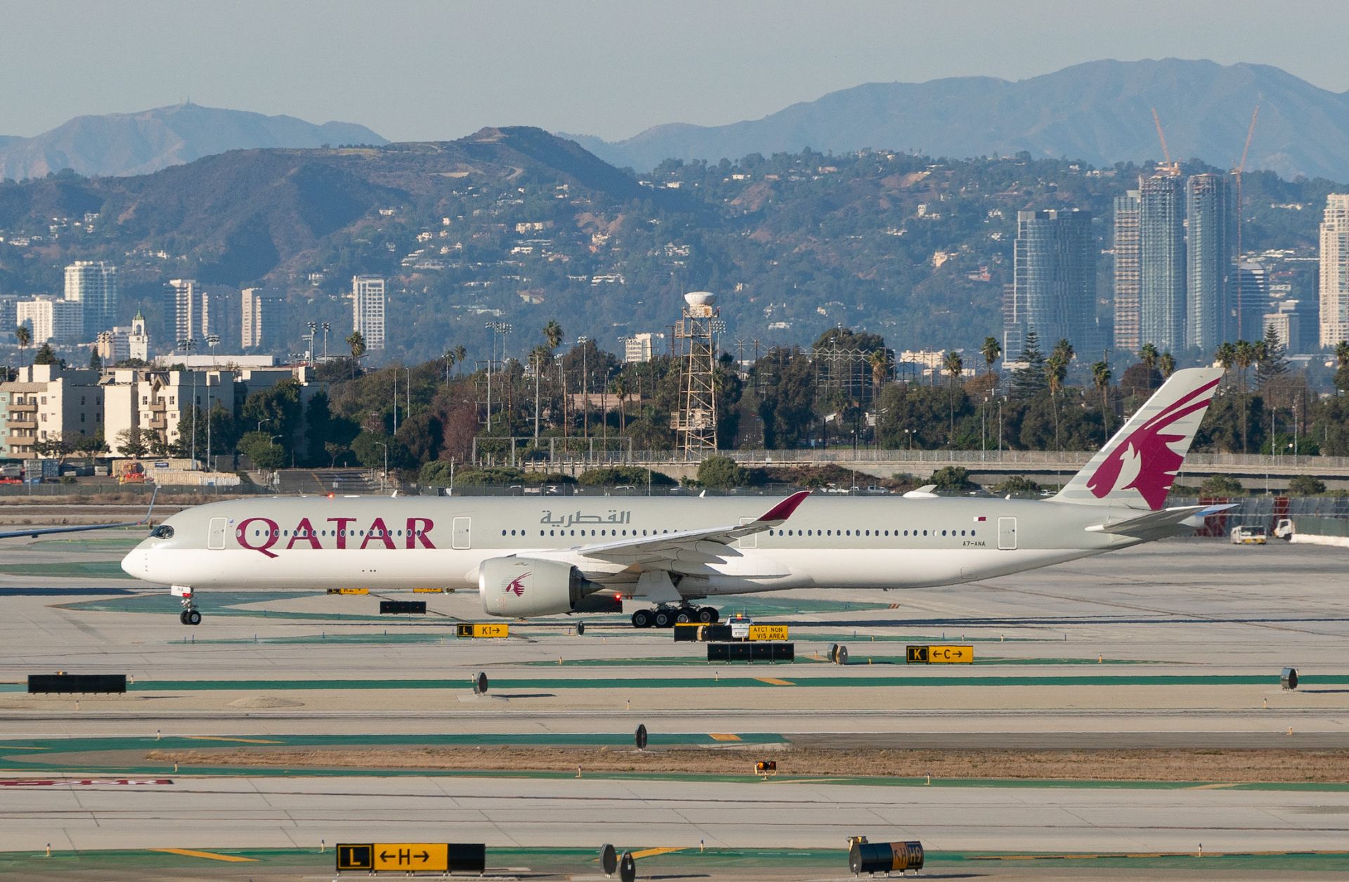 A Qatar Airways passenger jet prepares for take-off on the tarmac of the Los Angeles International Airport on Nov. 11, 2020, in Los Angeles, California. 