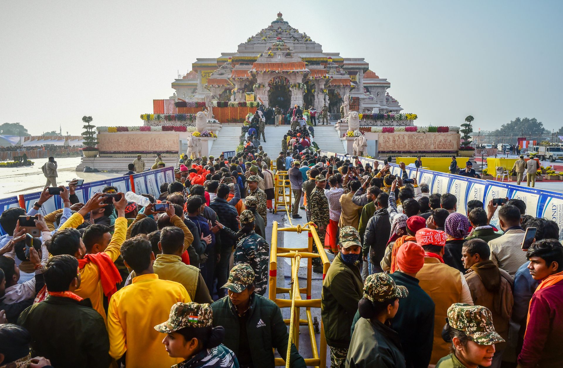 People line up to view a statue of Rama, a Hindu deity, at the newly consecrated Ram Temple on Jan. 23, 2024, in Ayodhya, India. 