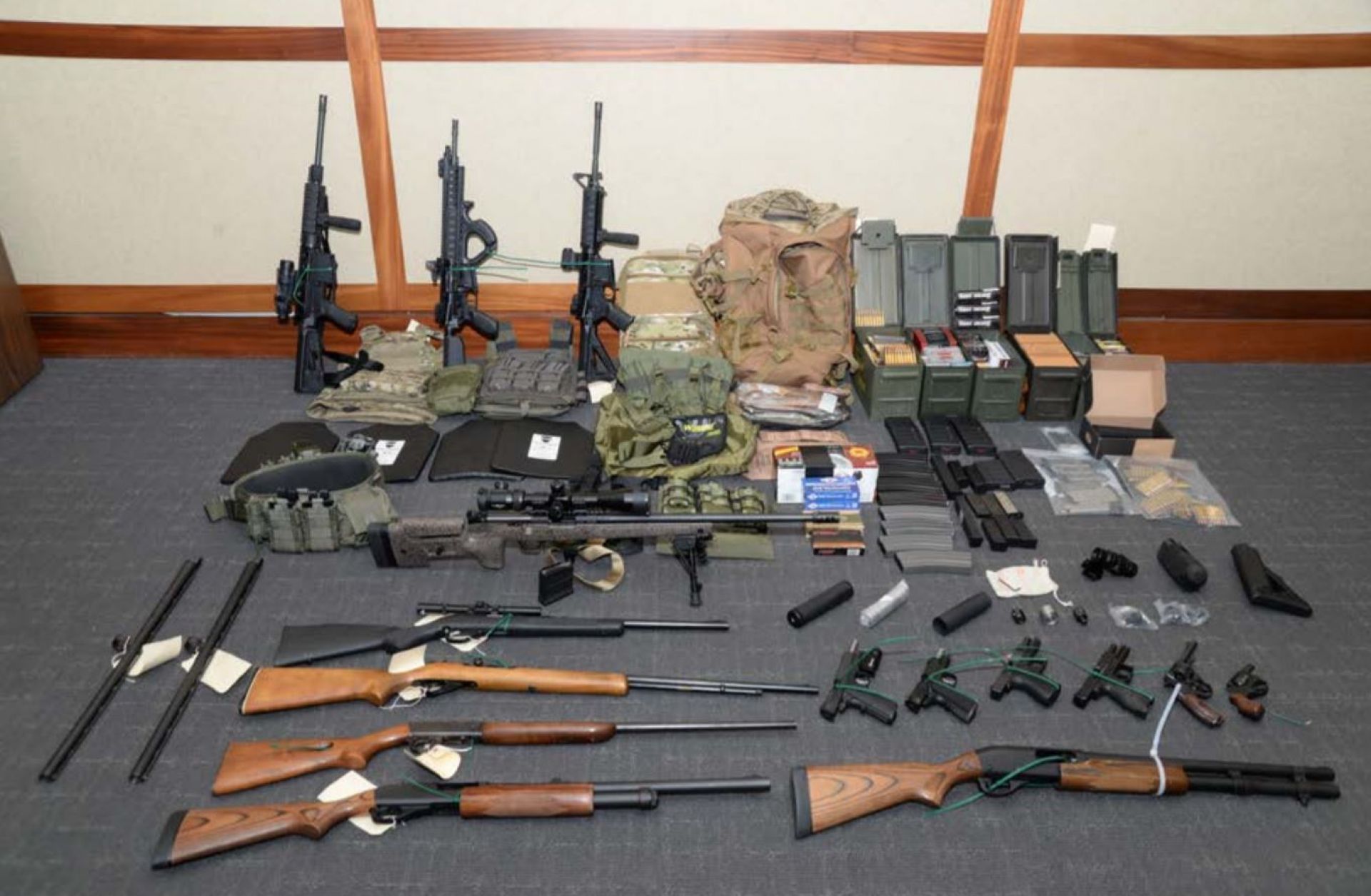 A collection of weapons and ammunition federal agents say they found in the apartment of a member of the U.S. Coast Guard accused of plotting a major terror attack against Americans.