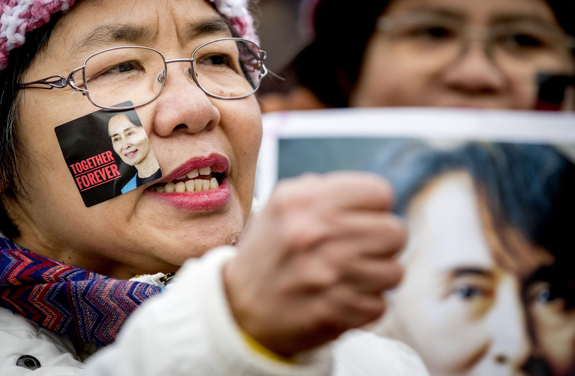 Supporters of Aung San Suu Kyi gather in The Hague, Netherlands, as the 1991 Nobel Peace Prize laureate defended Myanmar's military against allegations of ethnic cleansing and genocide before the International Court of Justice on Dec. 12, 2019.