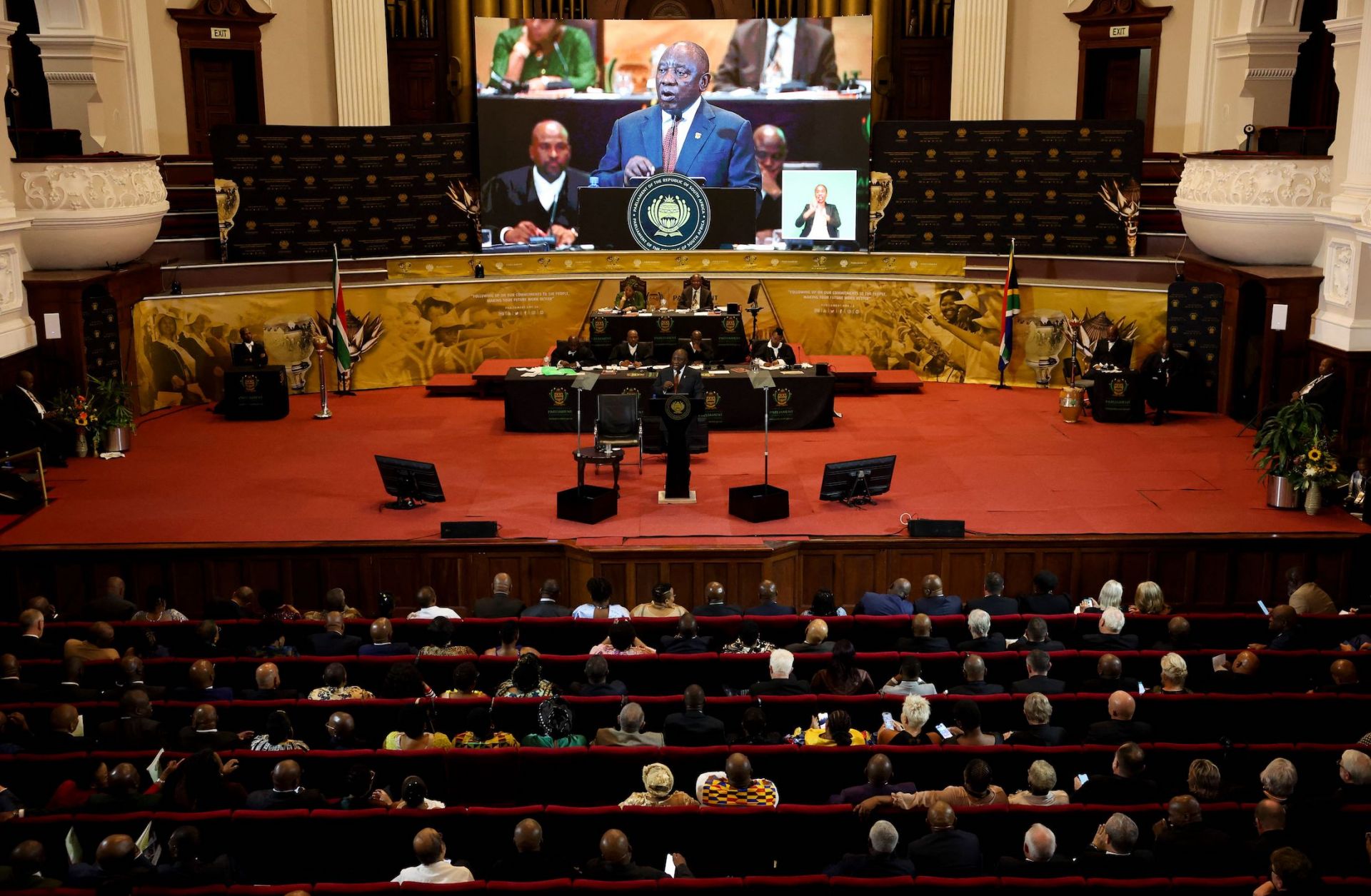 South African President Cyril Ramaphosa (center) delivers his 2023 state-of-the-nation address at the Cape Town City Hall on Feb. 9, 2023. 