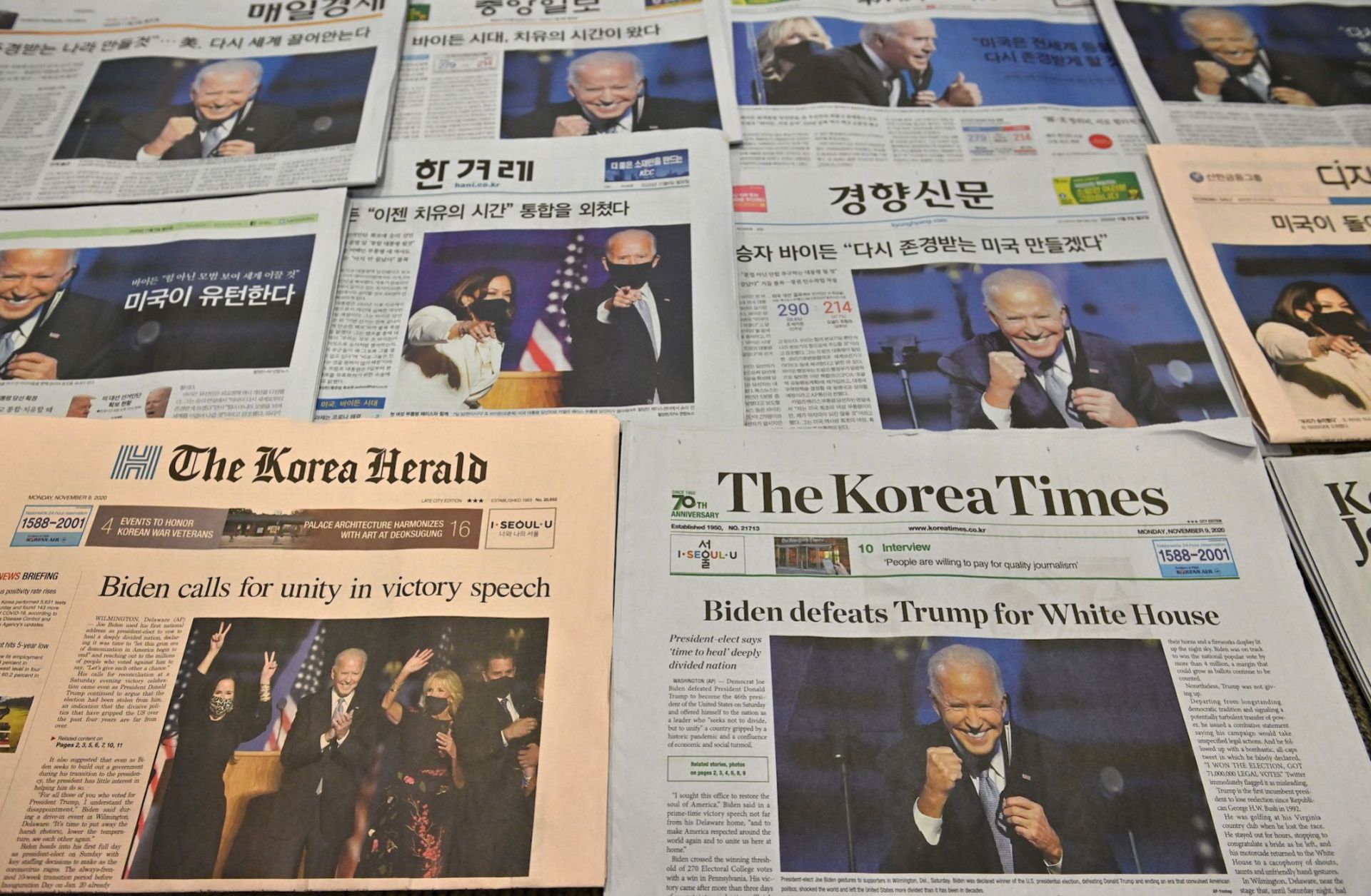 Photos and stories of U.S. President-elect Joe Biden dominate the headlines on the front pages of newspapers in Seoul, South Korea, on Nov. 9, 2020, 