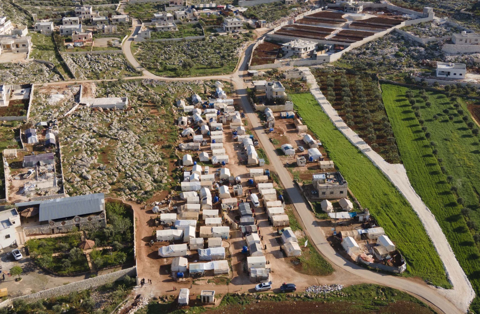 An ariel view shows a camp in Idlib for people displaced by Syria's ongoing civil war on April 13, 2021. 