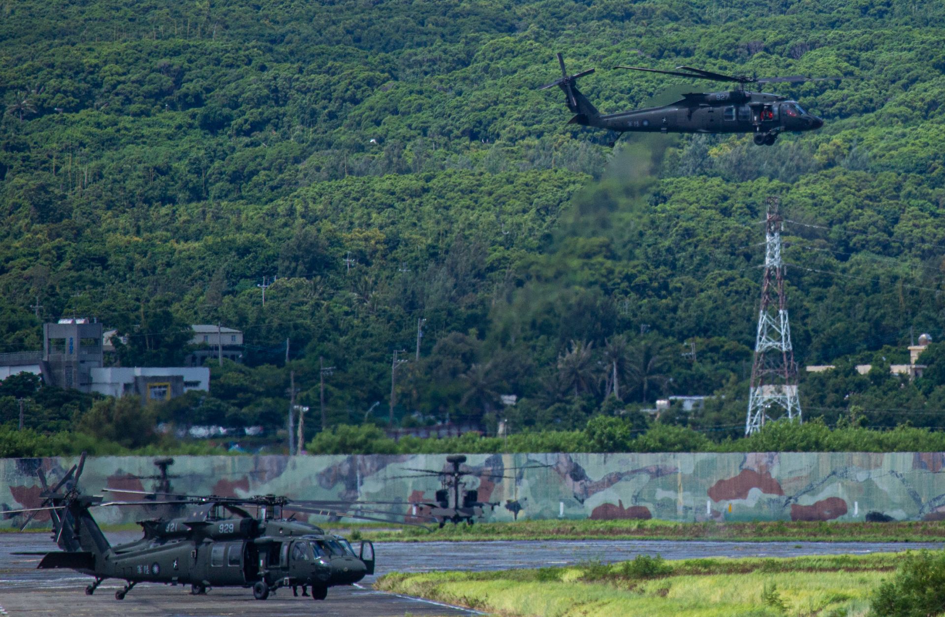 A Taiwanese military UH-60 black hawk helicopter takes off during a live-fire drill on Aug. 9, 2022, in Pingtung, Taiwan. 