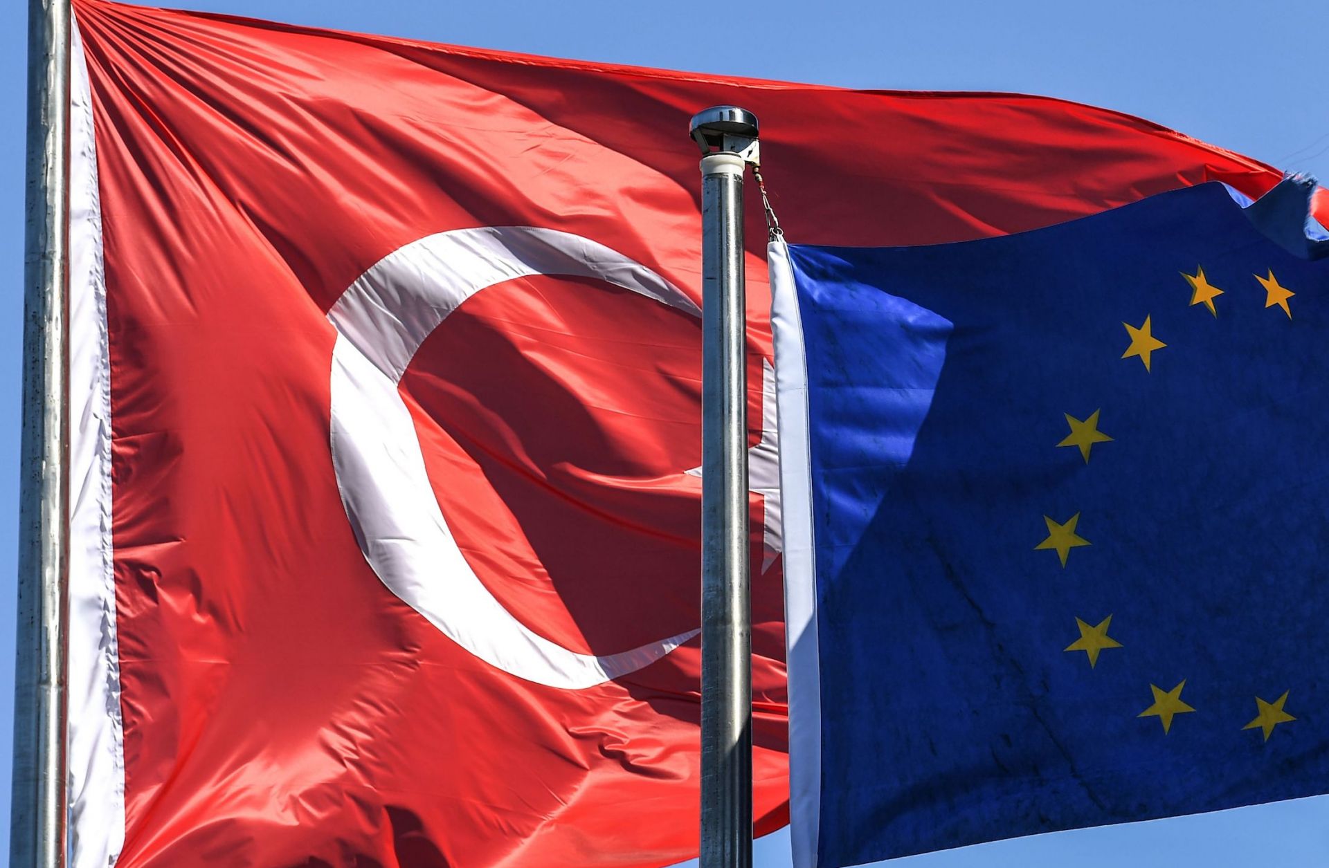 The Turkish and EU flags Aug. 15, 2018, in Istanbul's financial and business district of Maslak.