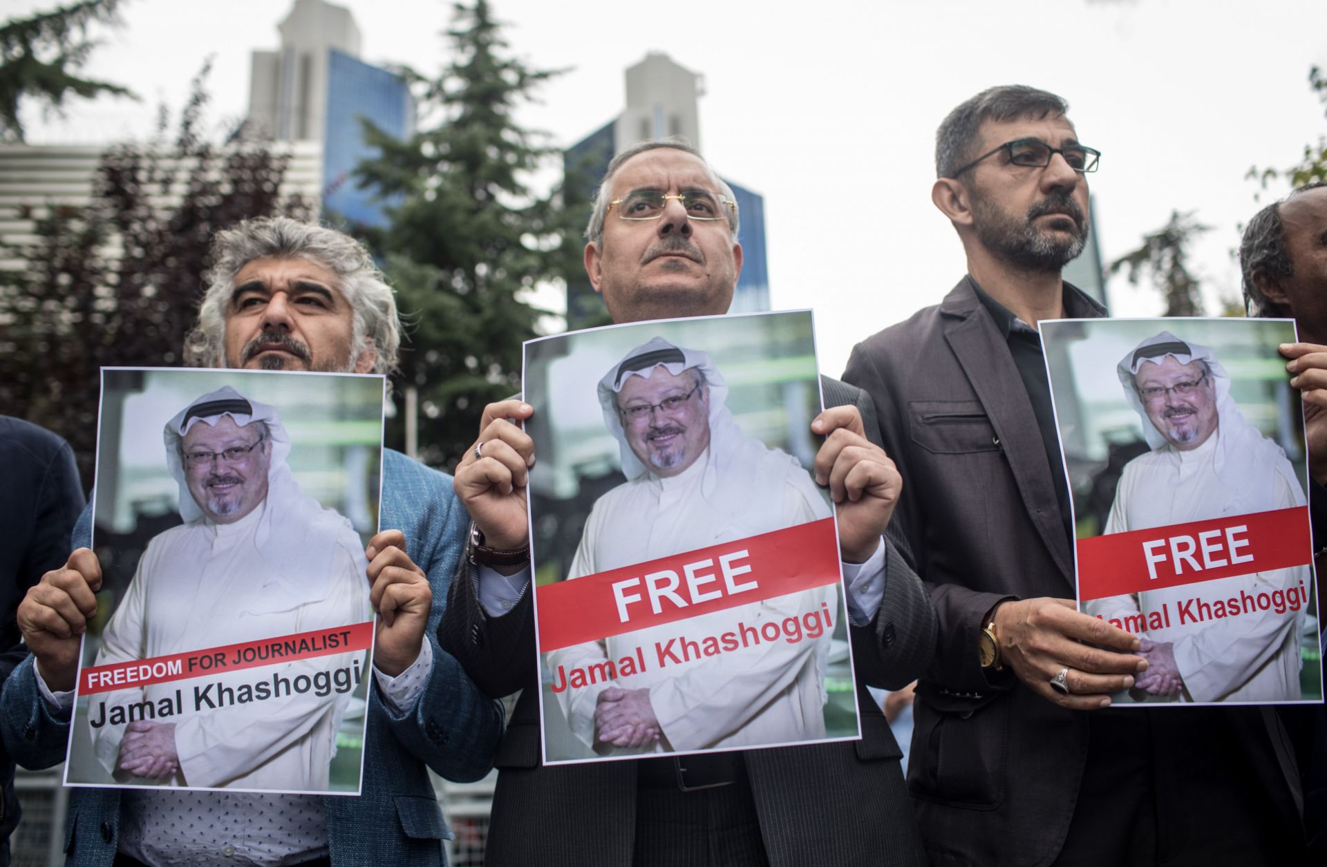 People hold posters of Saudi journalist Jamal Khashoggi during a protest organized by members of the Turkish-Arabic Media Association at the entrance to Saudi Arabia's consulate on Oct. 8 in Istanbul. 