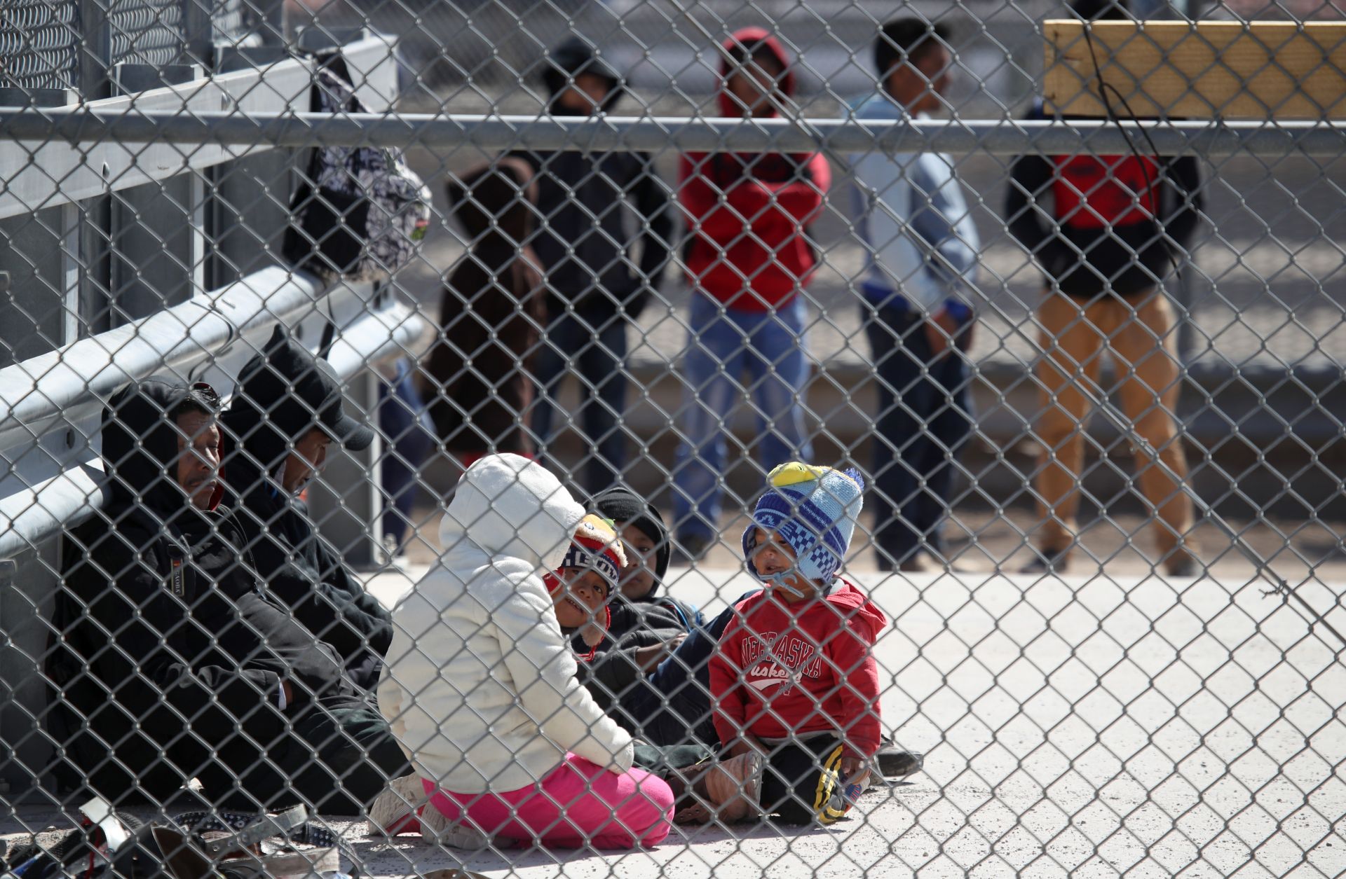 Migrants wait in a detention area on March 31, 2019, in El Paso, Texas.