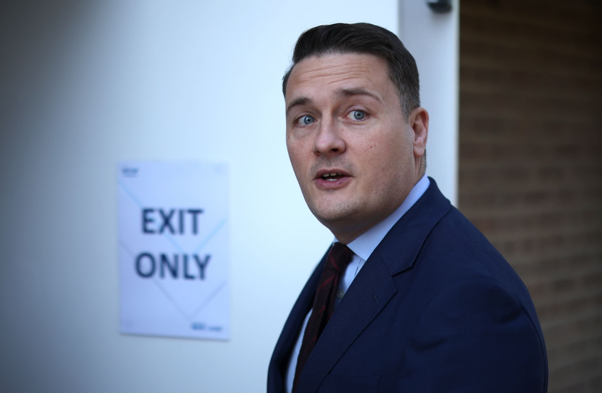 U.K. Health Secretary Wes Streeting arrives at the University of Kent in Canterbury, England, on March 19, 2026, as students receive the Meningitis B vaccine.