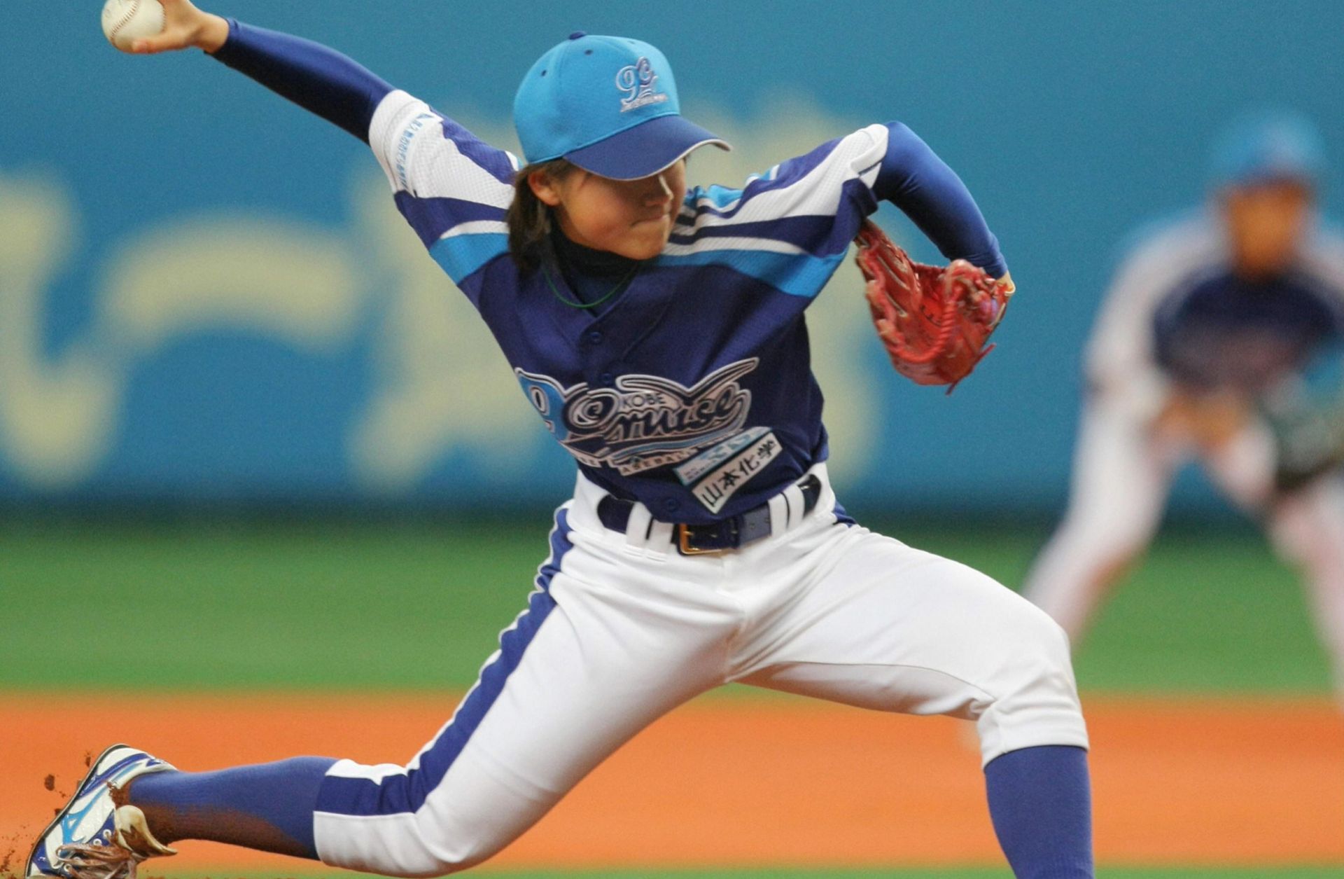 Seventeen-year-old schoolgirl Eri Yoshida became the first woman to play professional baseball with men in Japan when she took the mound at the weekend in a new independent league. 