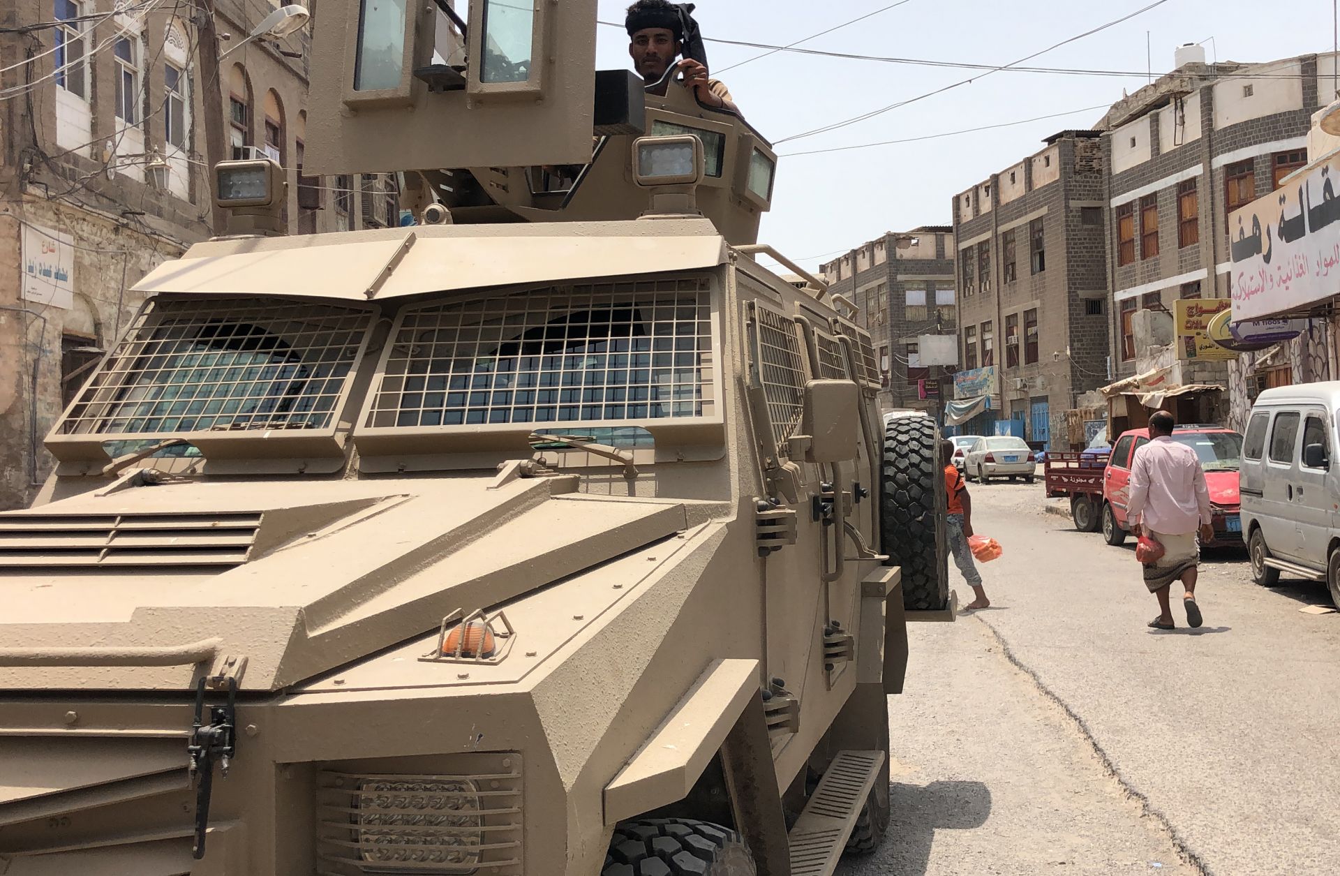 A member of the southern separatist movement rides an armored military vehicle in Aden, Yemen, on Aug. 11, 2019.