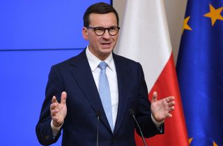 Polish Prime Minister Mateusz Morawiecki speaks during a press conference on Oct. 22, 2021, after meeting with EU leaders in Brussels. Polish Prime Minister Mateusz Morawiecki speaks during a press conference on Oct. 22, 2021, after meeting with EU leaders in Brussels.