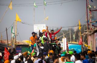 Farmers in India celebrate on Nov. 19, 2021, after the government announced it was repealing the controversial agricultural reforms that sparked nearly a year of protests in the country.