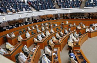 Kuwaiti legislators attend a parliamentary session at the National Assembly building in Kuwait City, Kuwait, on Oct. 20, 2020. 