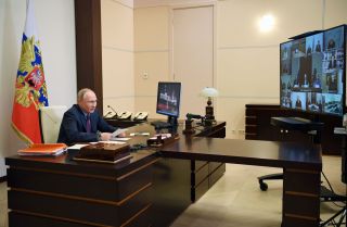 Russian President Vladimir Putin chairs a meeting of the Presidential Council for Civil Society and Human Rights via a video conference call Dec. 10, 2020, at the Novo-Ogaryovo state residence outside Moscow.