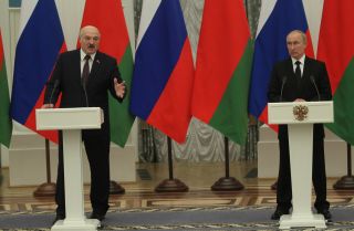 Russian President Vladimir Putin (right) and Belarusian President Alexander Lukashenko hold a joint press conference in Moscow on Sept. 9, 2021. 