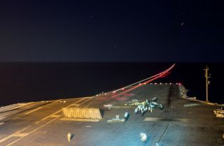 An F/A-18E Super Hornet launches May 10, 2019 in the Red Sea from the flight deck of the Nimitz-class aircraft carrier USS Abraham Lincoln.