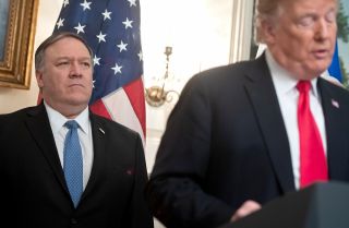 US President Donald Trump speaks alongside US Secretary of State Mike Pompeo (L) prior to signing a Proclamation on the Golan Heights in the Diplomatic Reception Room at the White House in Washington, DC, March 25, 2019, during a visit by Israeli Prime Minister Benjamin Netanyahu. 
