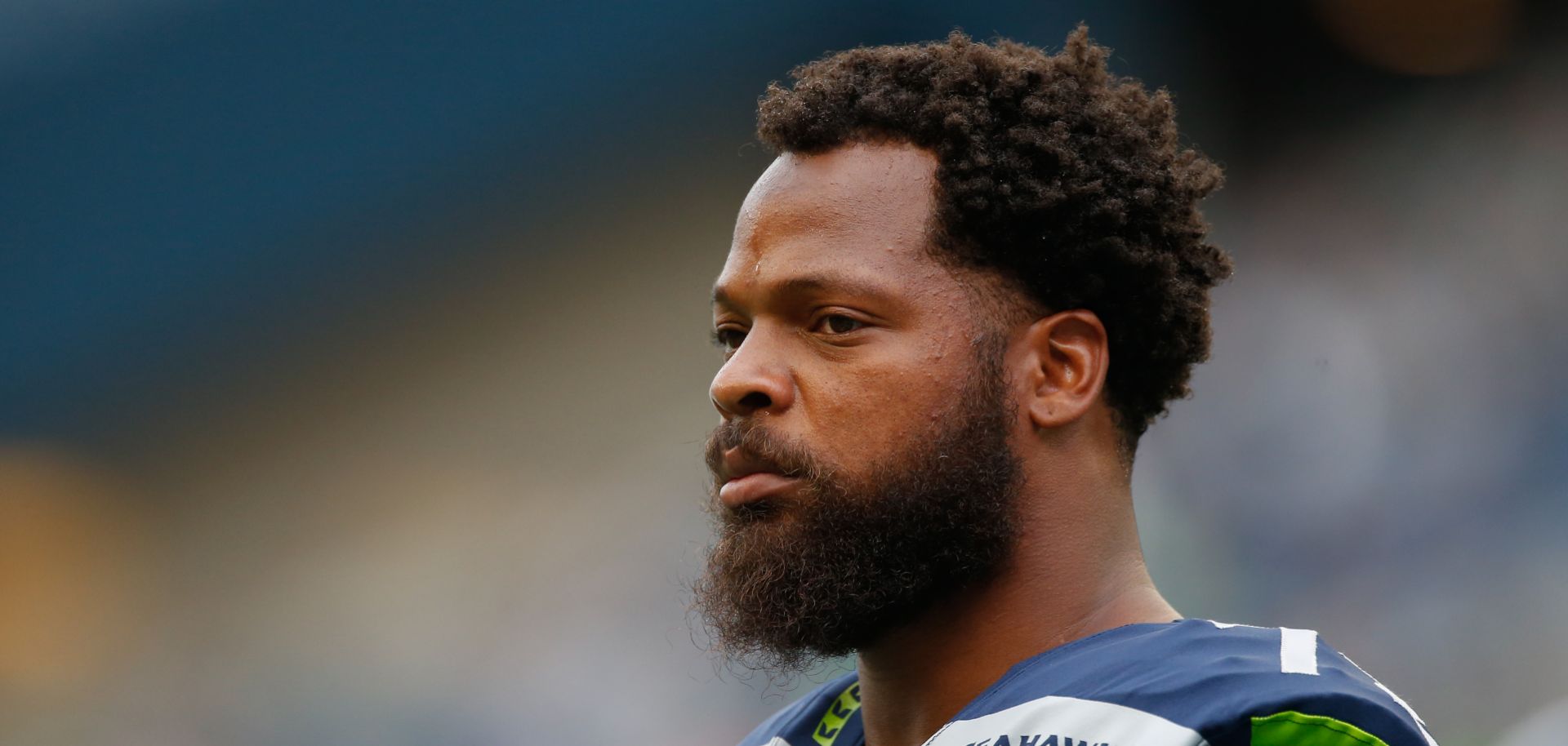 Defensive end Michael Bennett of the Seattle Seahawks looks on prior to the game against the Minnesota Vikings on Aug. 18, 2017, in Seattle, Washington.