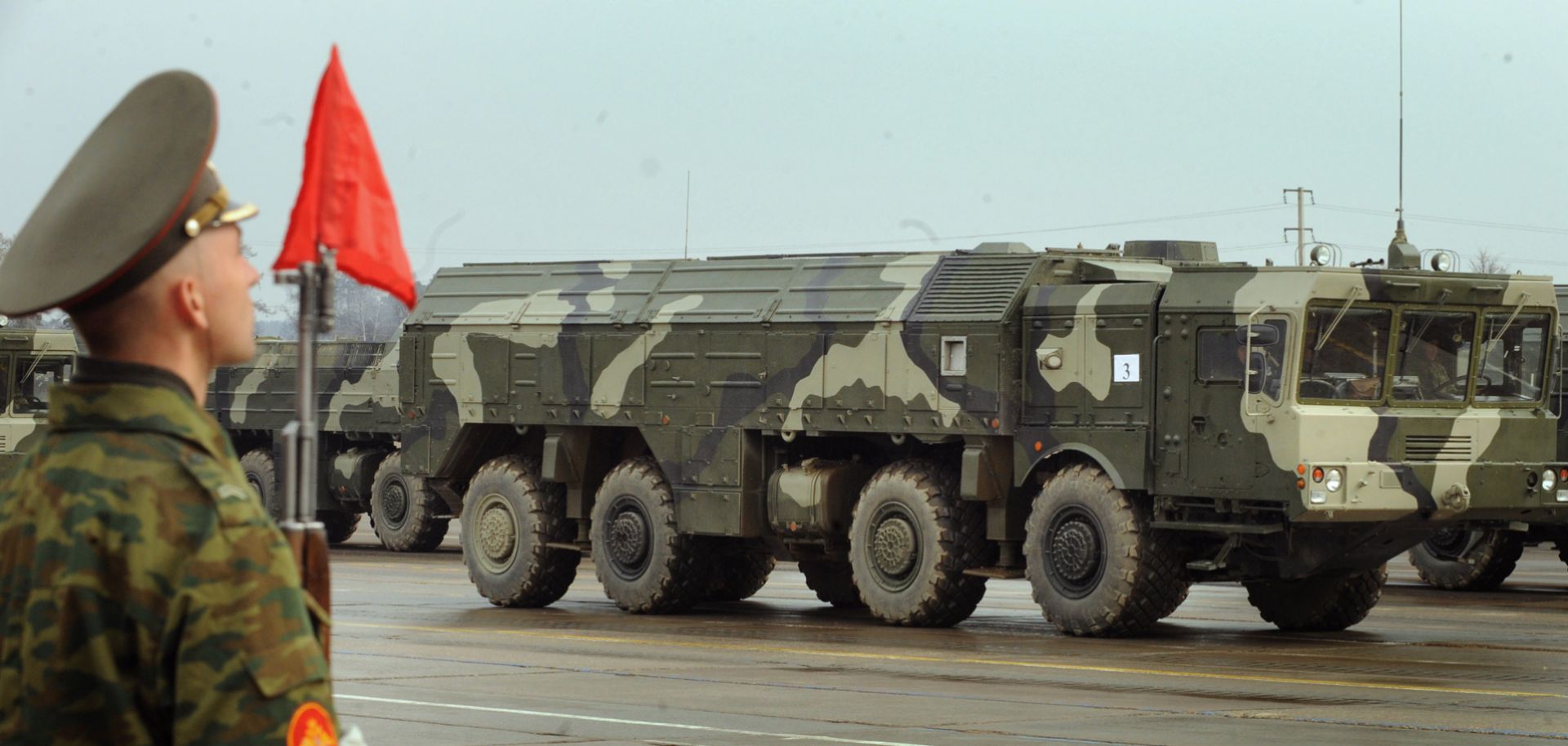 A Russian missile launcher rolls through Moscow's outskirts while rehearsing for a parade.