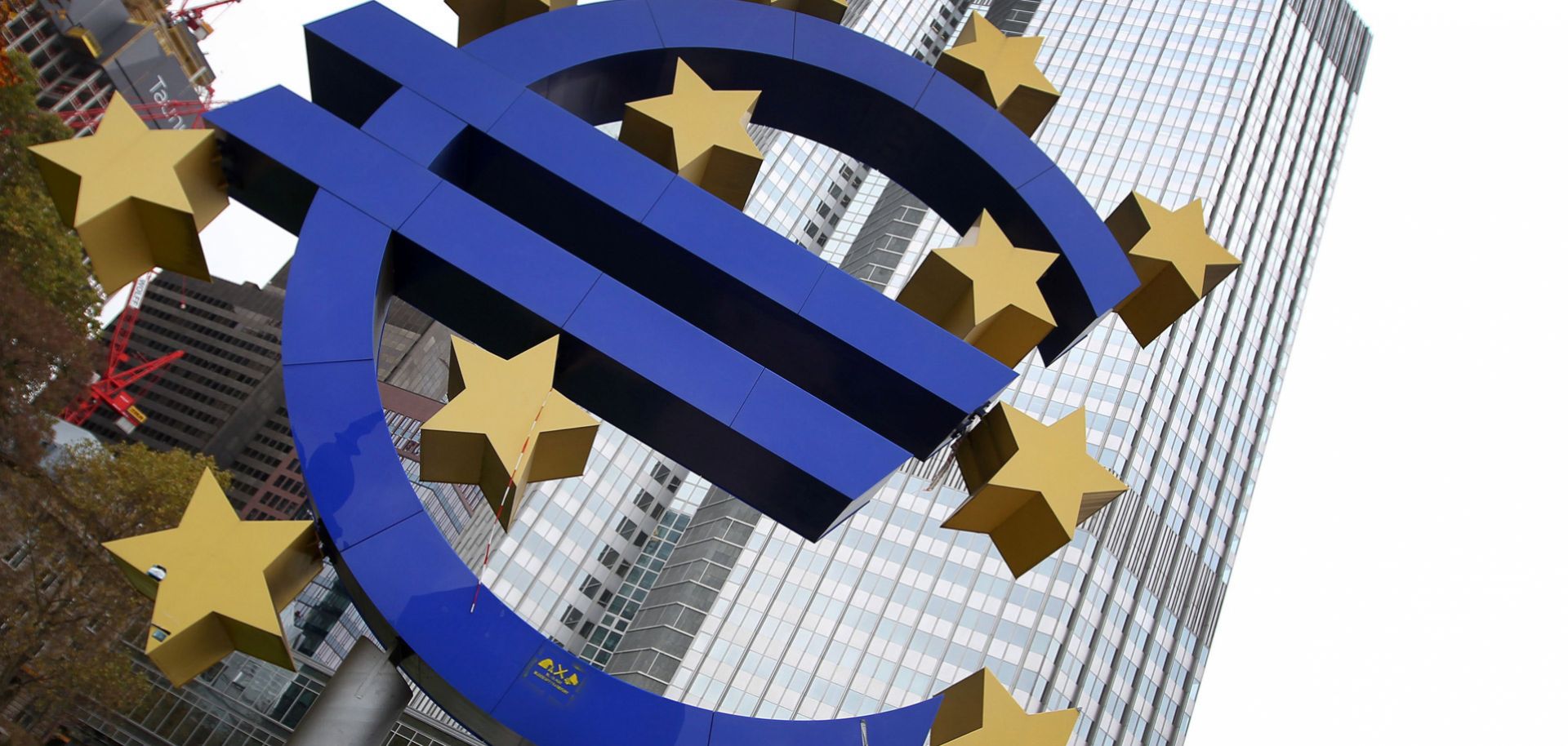 A statue of the euro symbol by German artist Ottman Hoerl stands in front of European Central Bank headquarters in Berlin.