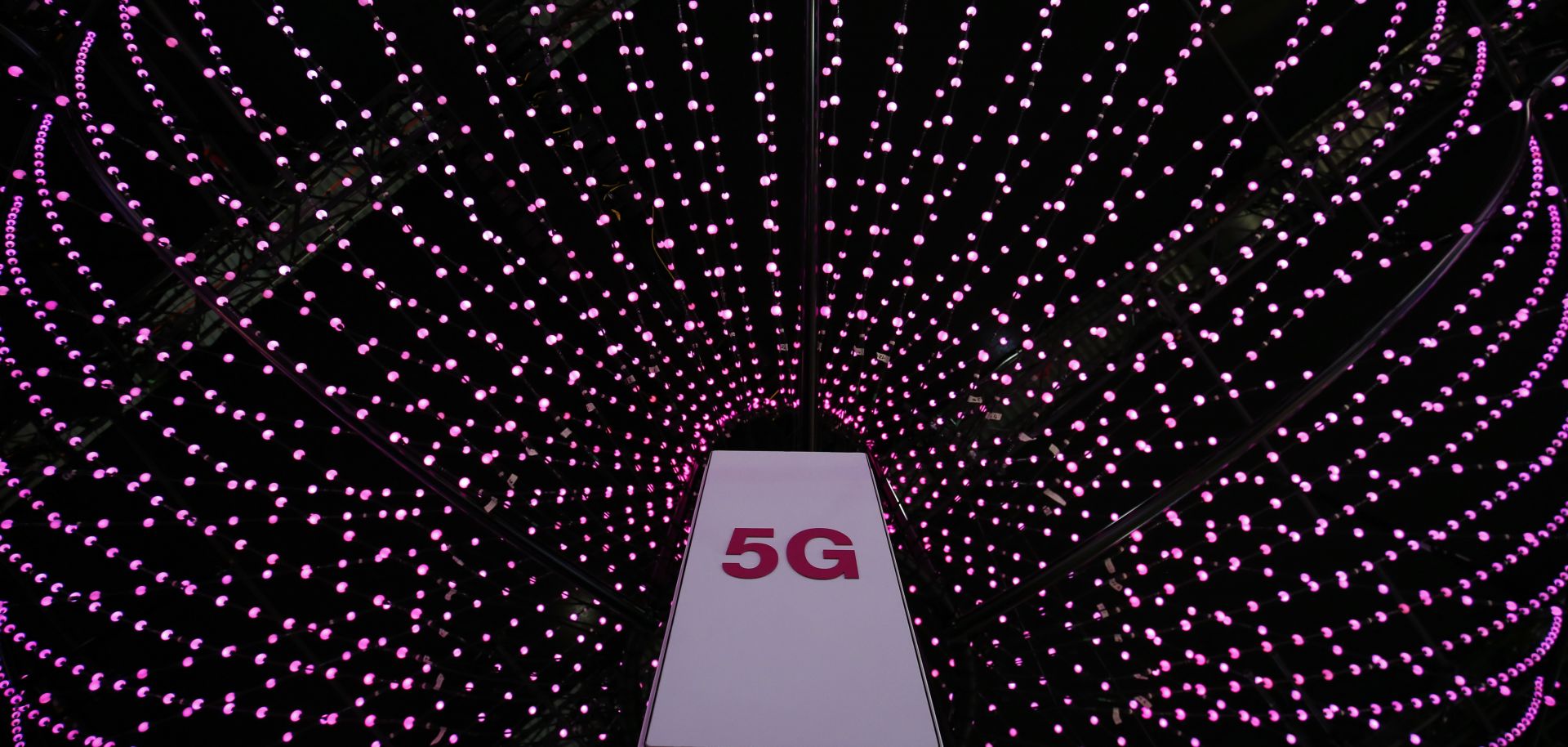 Deutsche Telekom shows off a 5G antenna at its booth at the 2018 Mobile World Congress in Barcelona.
