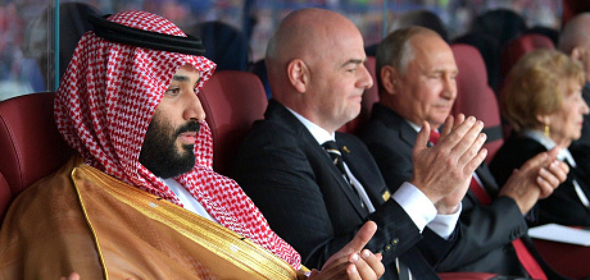 Saudi Crown Prince Mohammed bin Salman (L) and Russian President Vladimir Putin (R) watch their national teams square off in the first match of the 2018 FIFA World Cup in Moscow on June 14.