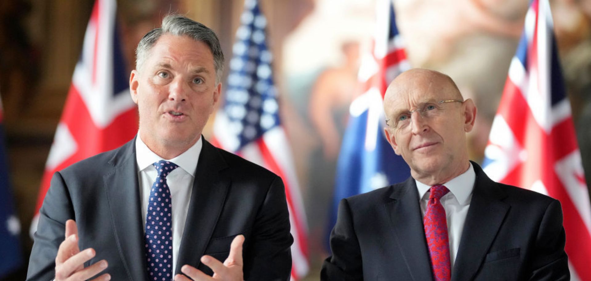 Australian Defense Minister Richard Marles and British Defense Secretary John Healey sit together for the AUKUS Defense Ministers Meeting at Old Royal Naval College on Sept. 26, 2024, in London, England.