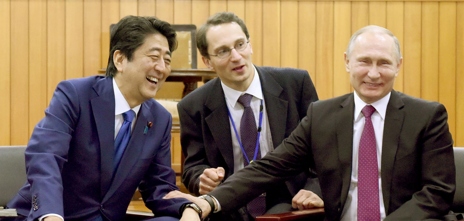 Russian President Vladimir Putin (right) and Japanese Prime Minister Shinzo Abe (left) share a laugh at the headquarters of worldwide judo community, the Kodokan Judo Institute, on Dec. 16, 2016.