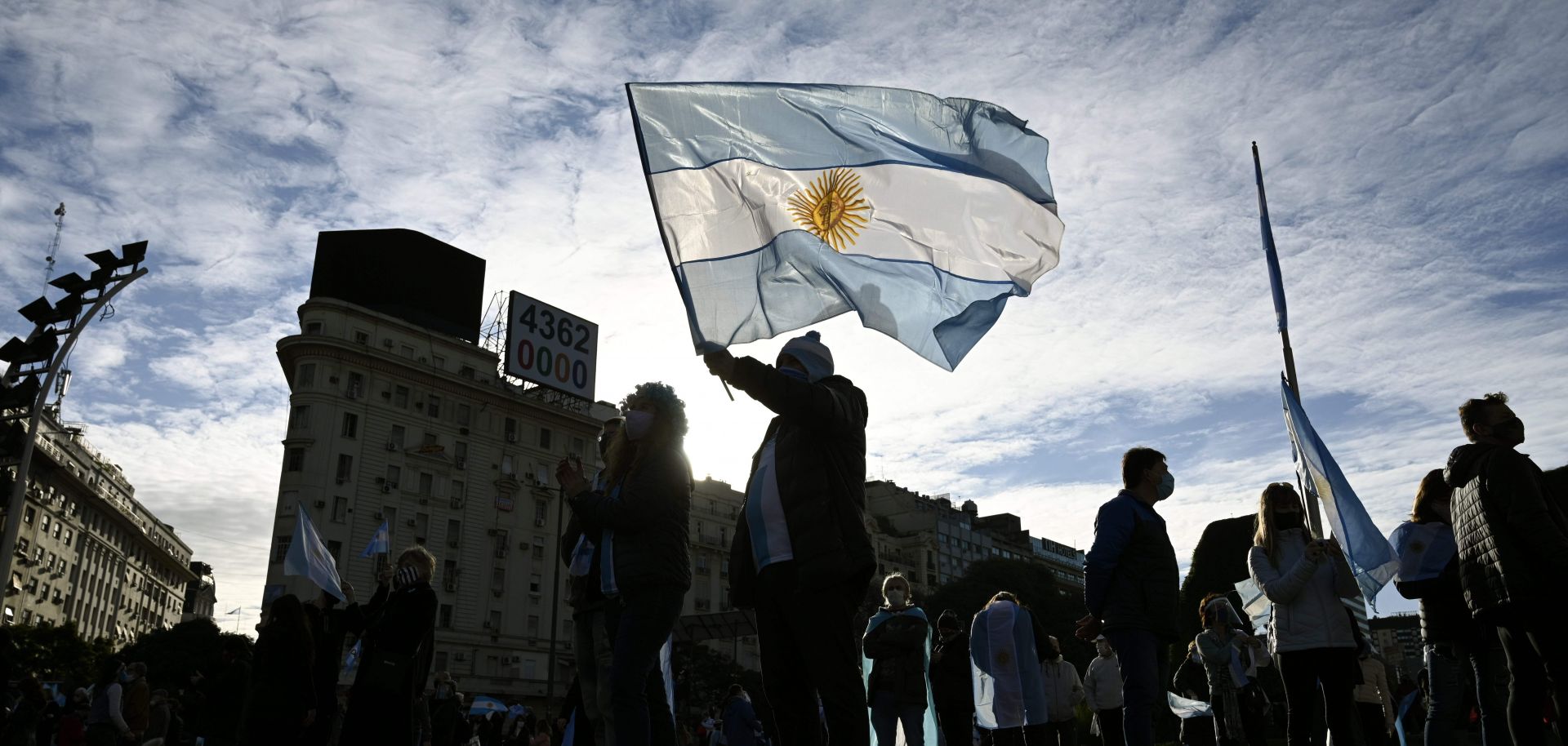 Man waves the Argentine flag