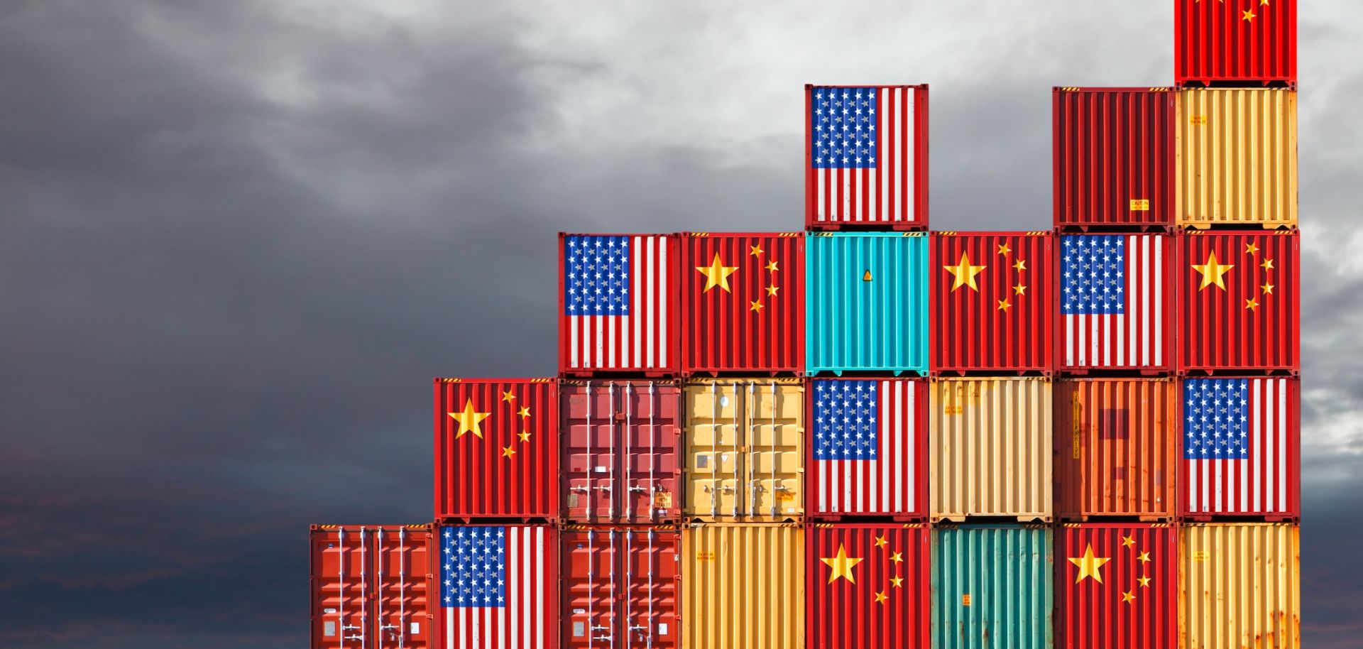 Cargo containers painted with Chinese and U.S. flags.