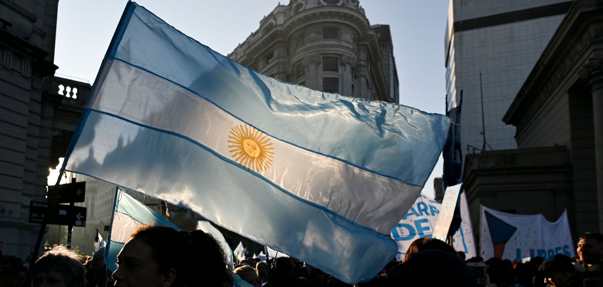 Protesters wave an Argentine flag at an anti-government rally in Buenos Aires on July 9, 2022. 