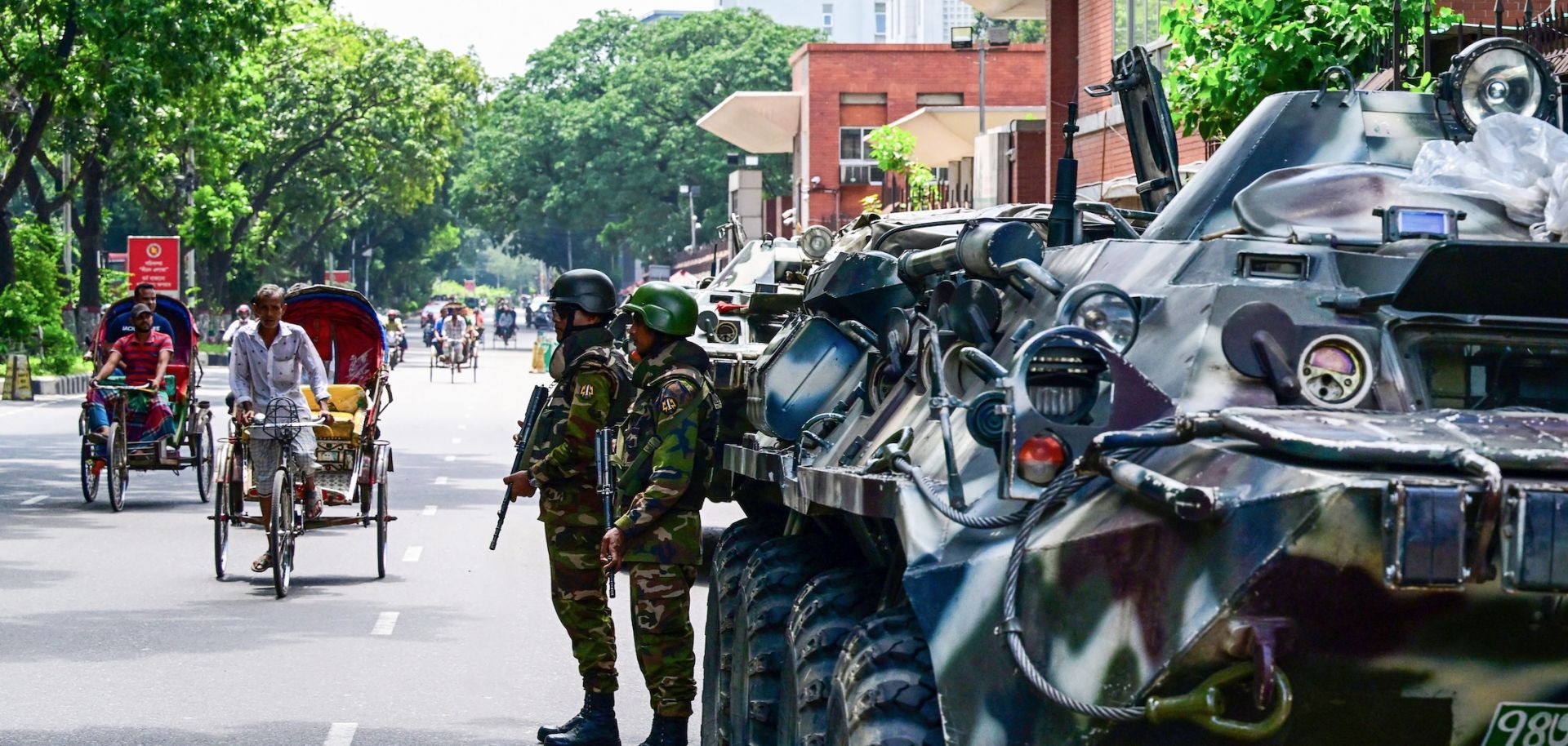 Bangladeshi soldiers stand guard in Dhaka on July 27, 2024.