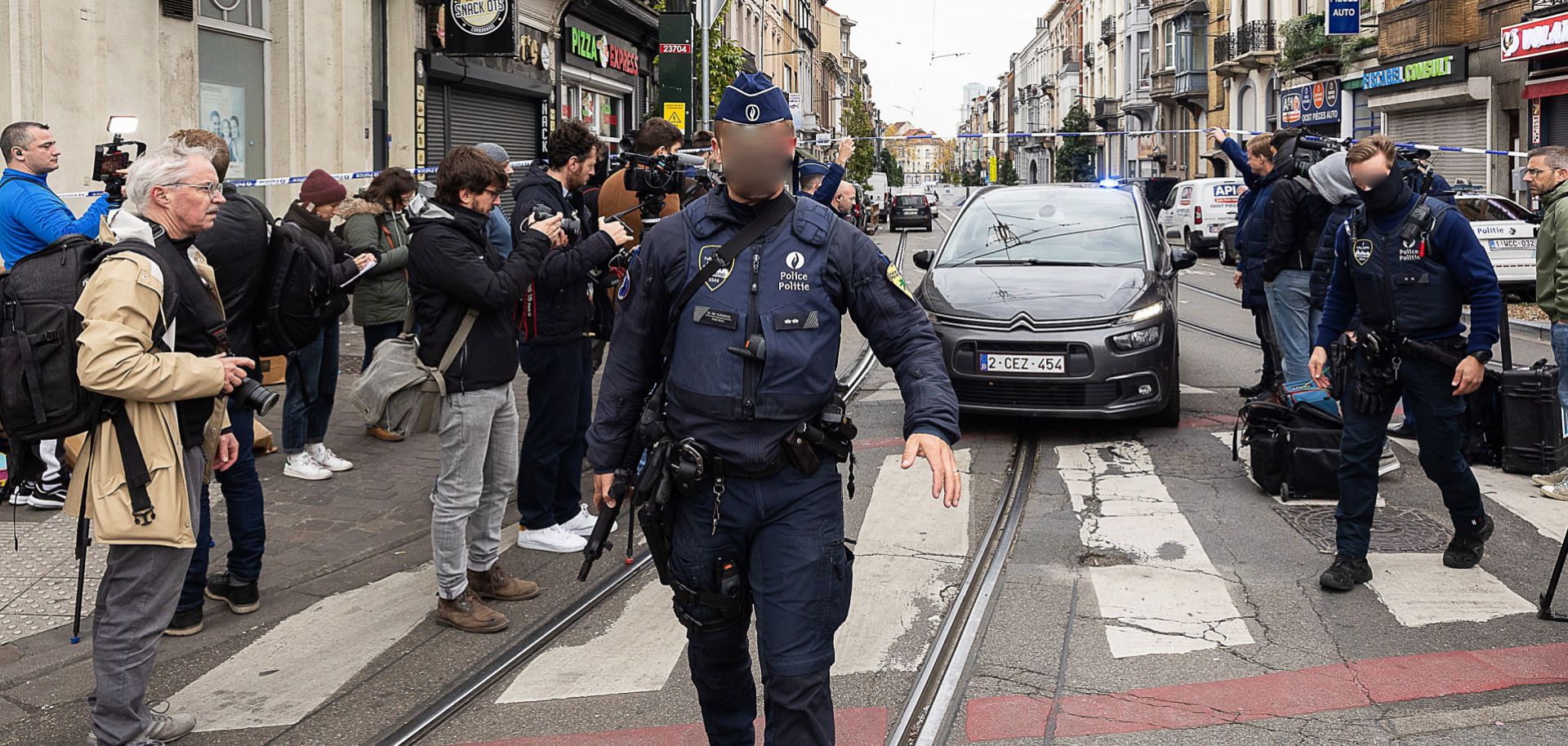 The street in the Schaerbeek area of Brussels on Oc. 17, 2023, after the suspected perpetrator of a fatal terrorist attack in the Belgian capital was shot dead.