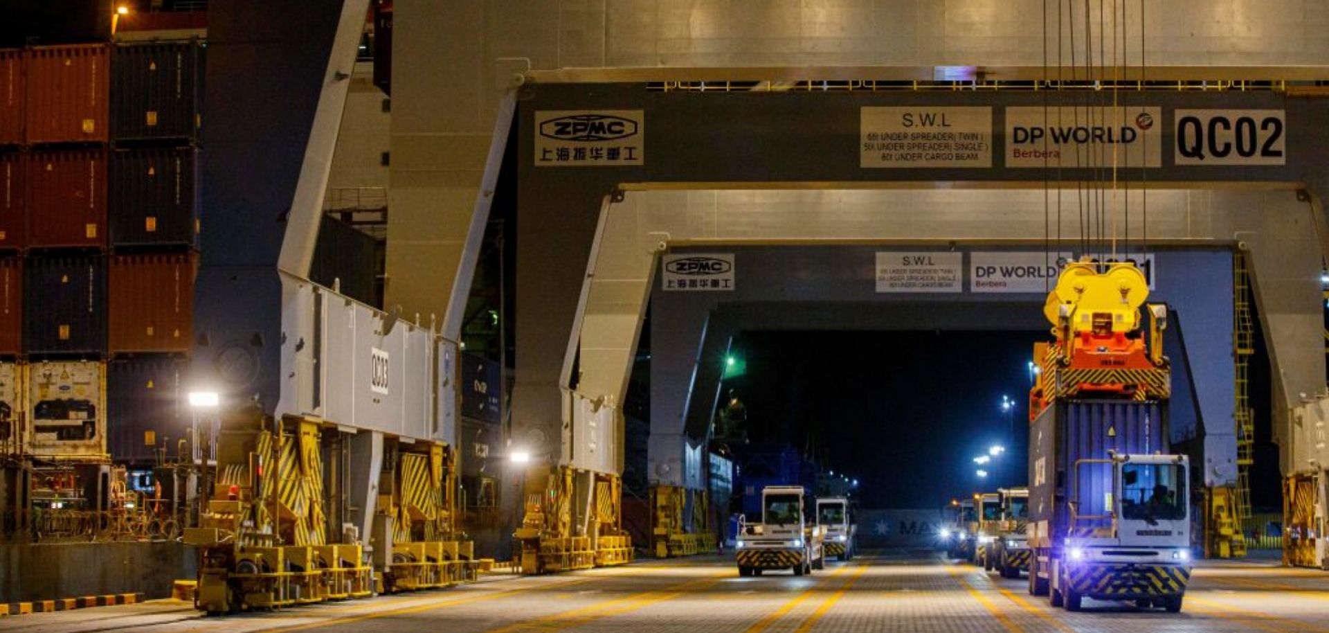 Shipping containers are offloaded from a vessel at Berbera Port in Somaliland on Aug. 31, 2021.